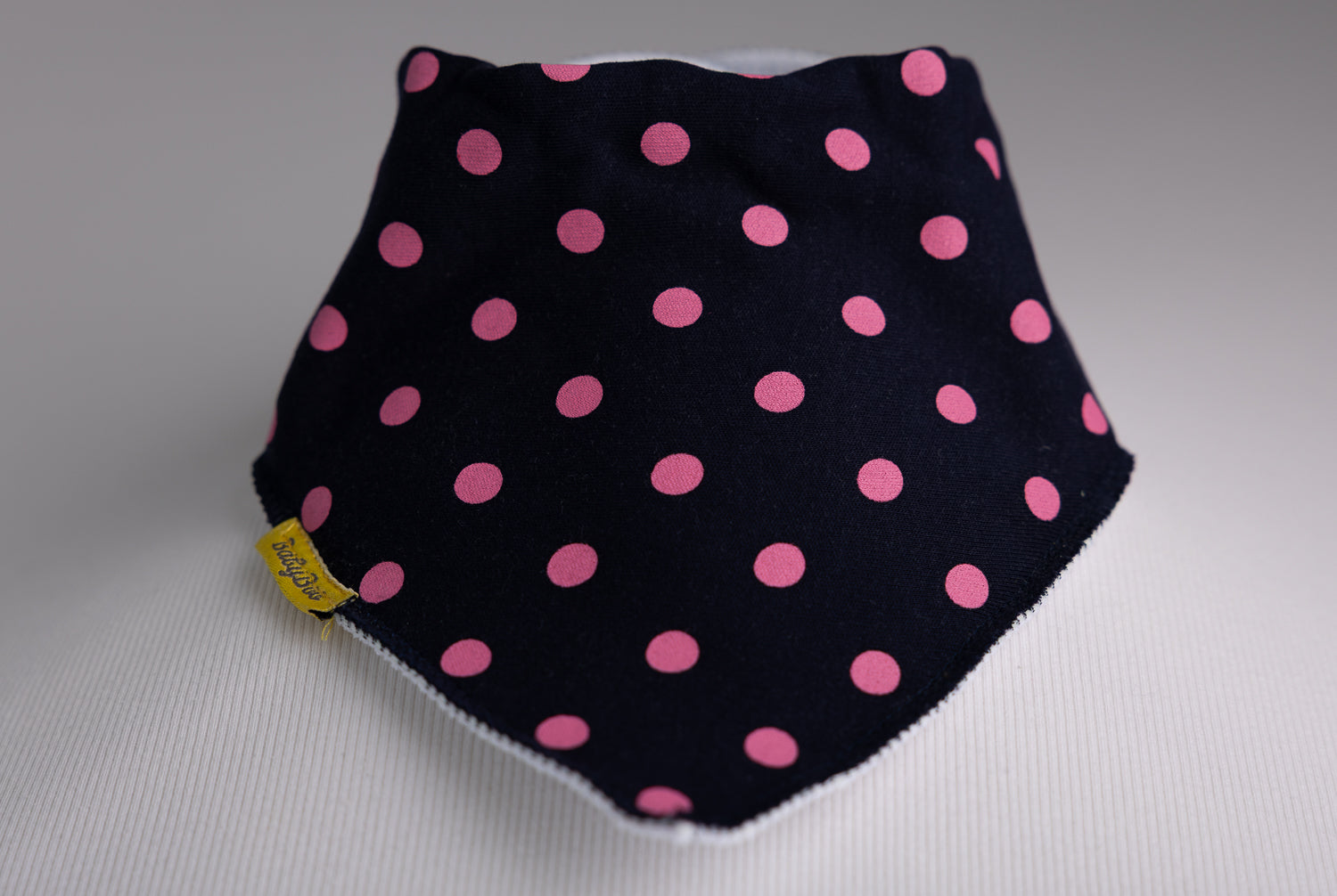 Navy with pink polka organic cotton DribbleBoo bandana bib