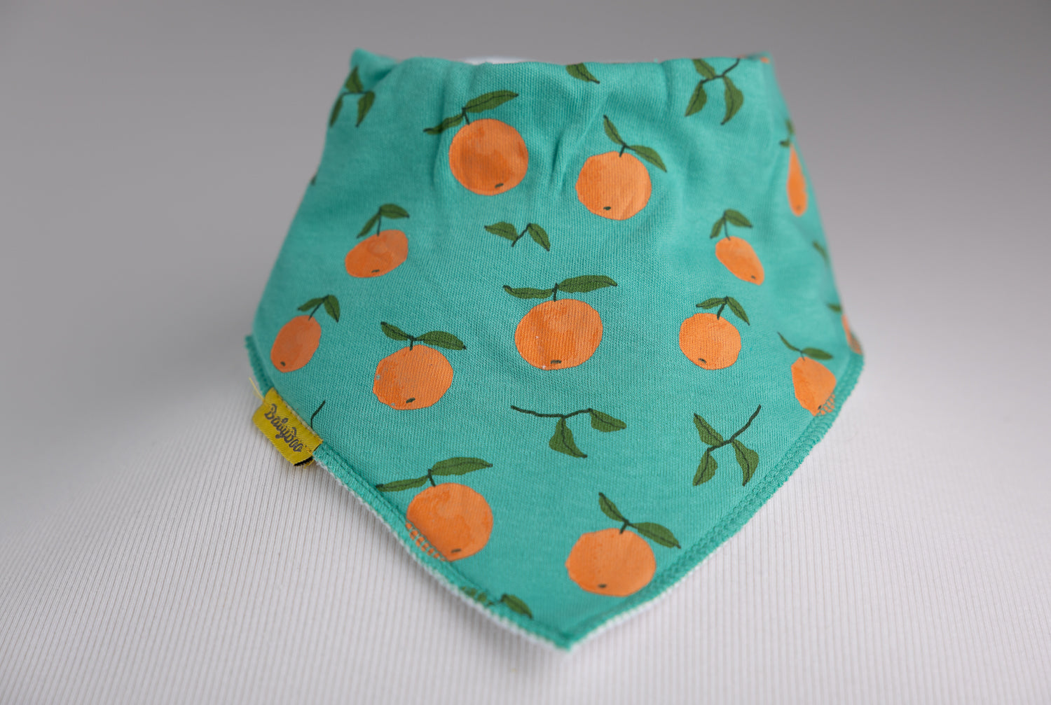 Teal tangerines organic cotton DribbleBoo bandana bib