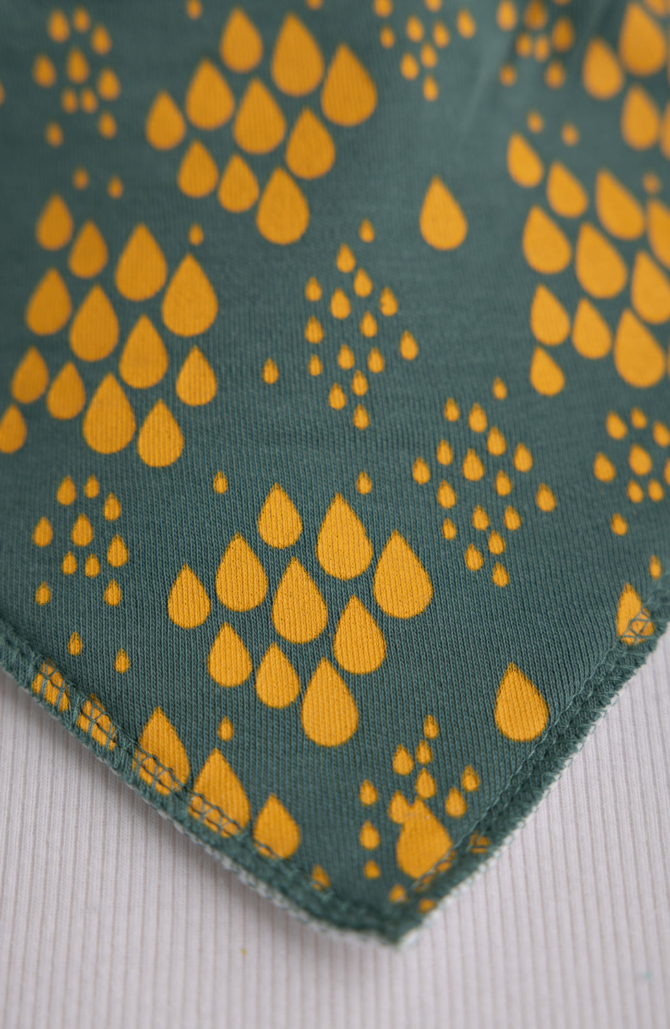 Teal with mustard raindrops organic cotton DribbleBoo bandana bib