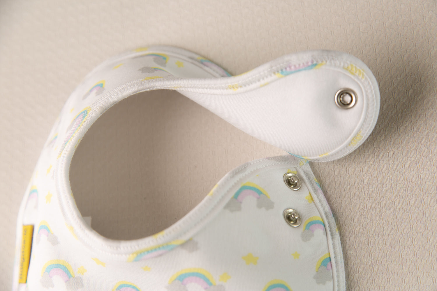 Painted rainbows white organic cotton LittleBoo baby bib