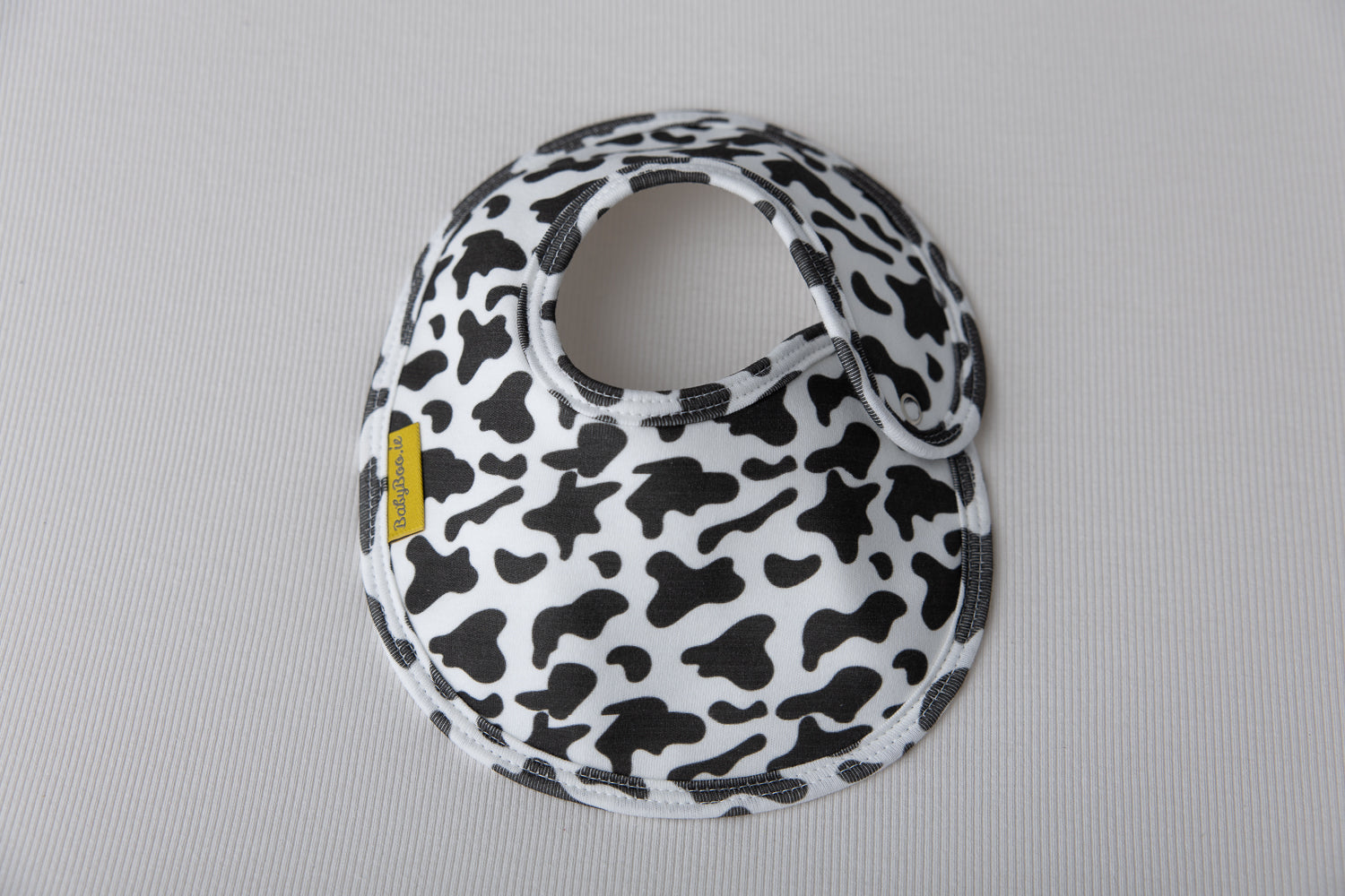 Cow print organic cotton LittleBoo baby bib