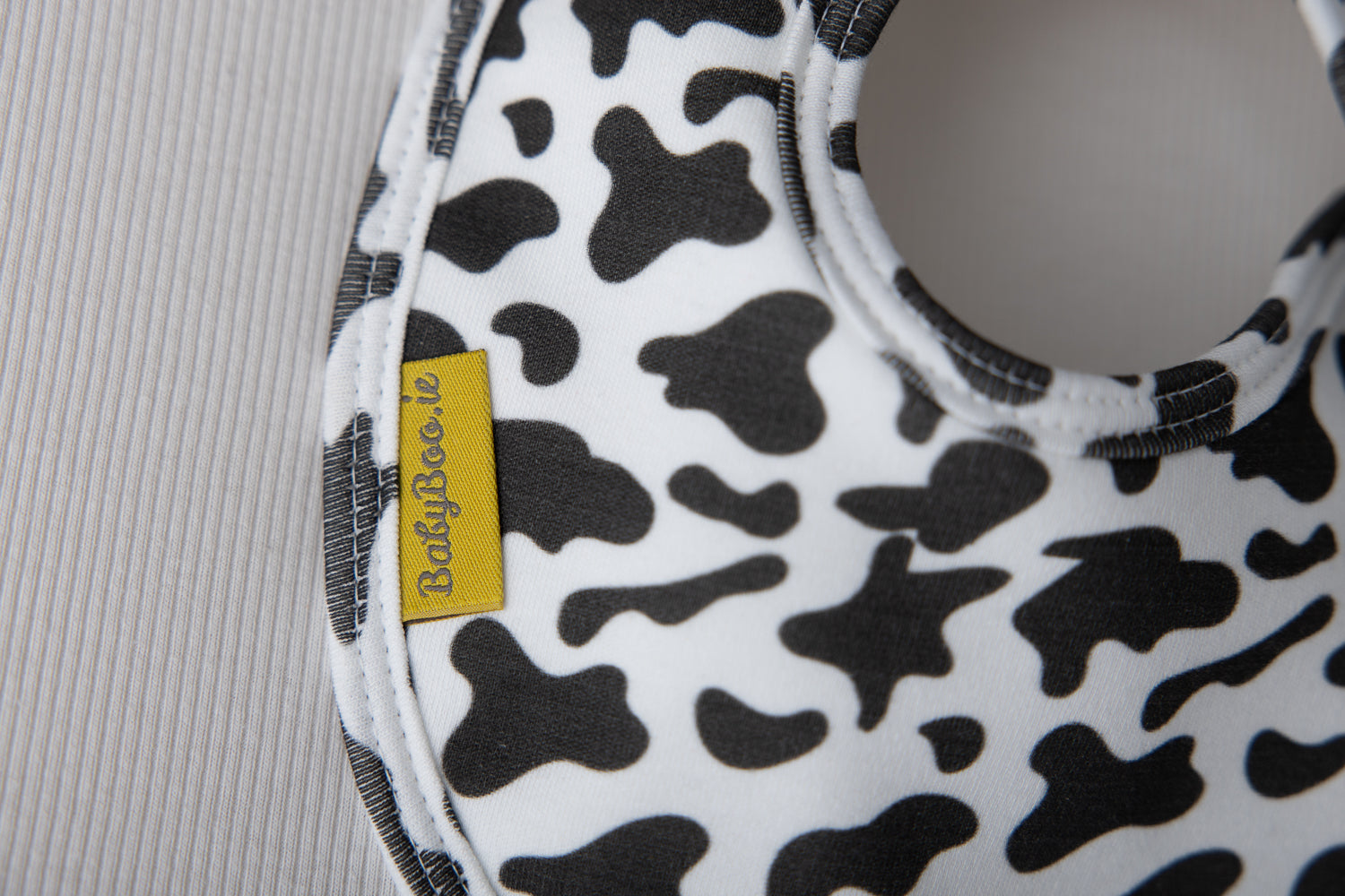 Cow print organic cotton LittleBoo baby bib