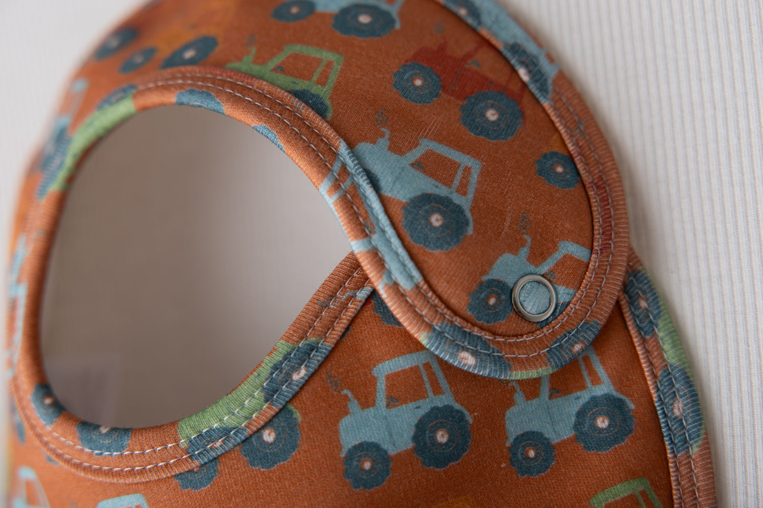 Rust tractors organic cotton LittleBoo baby bib