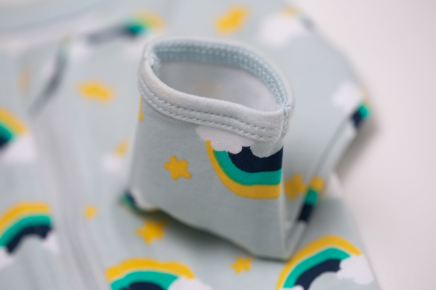 Aqua rainbows with navy organic cotton ZippyBoo suit