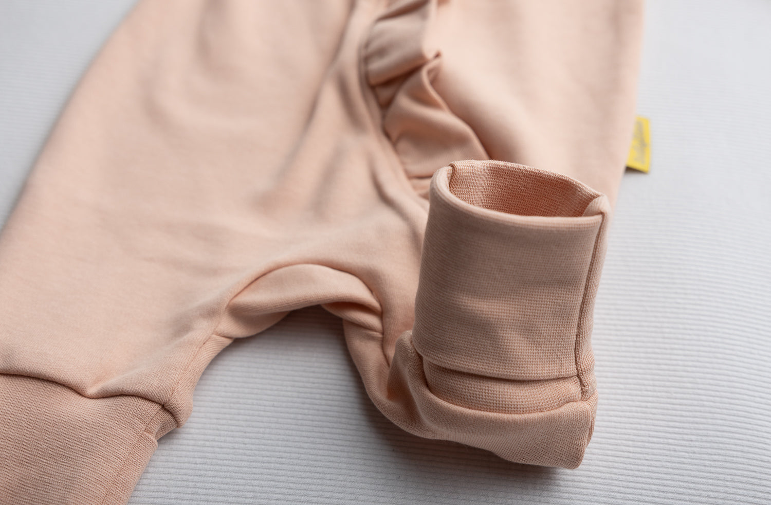 Peach ruffle organic cotton ZippyBoo suit