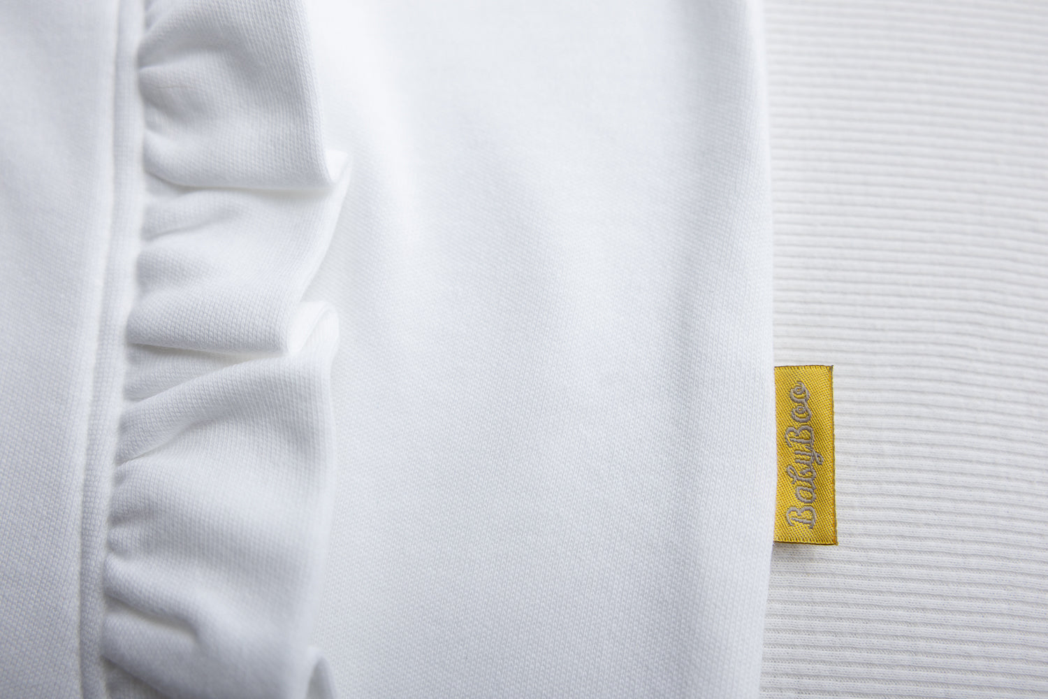 White ruffle organic cotton ZippyBoo suit