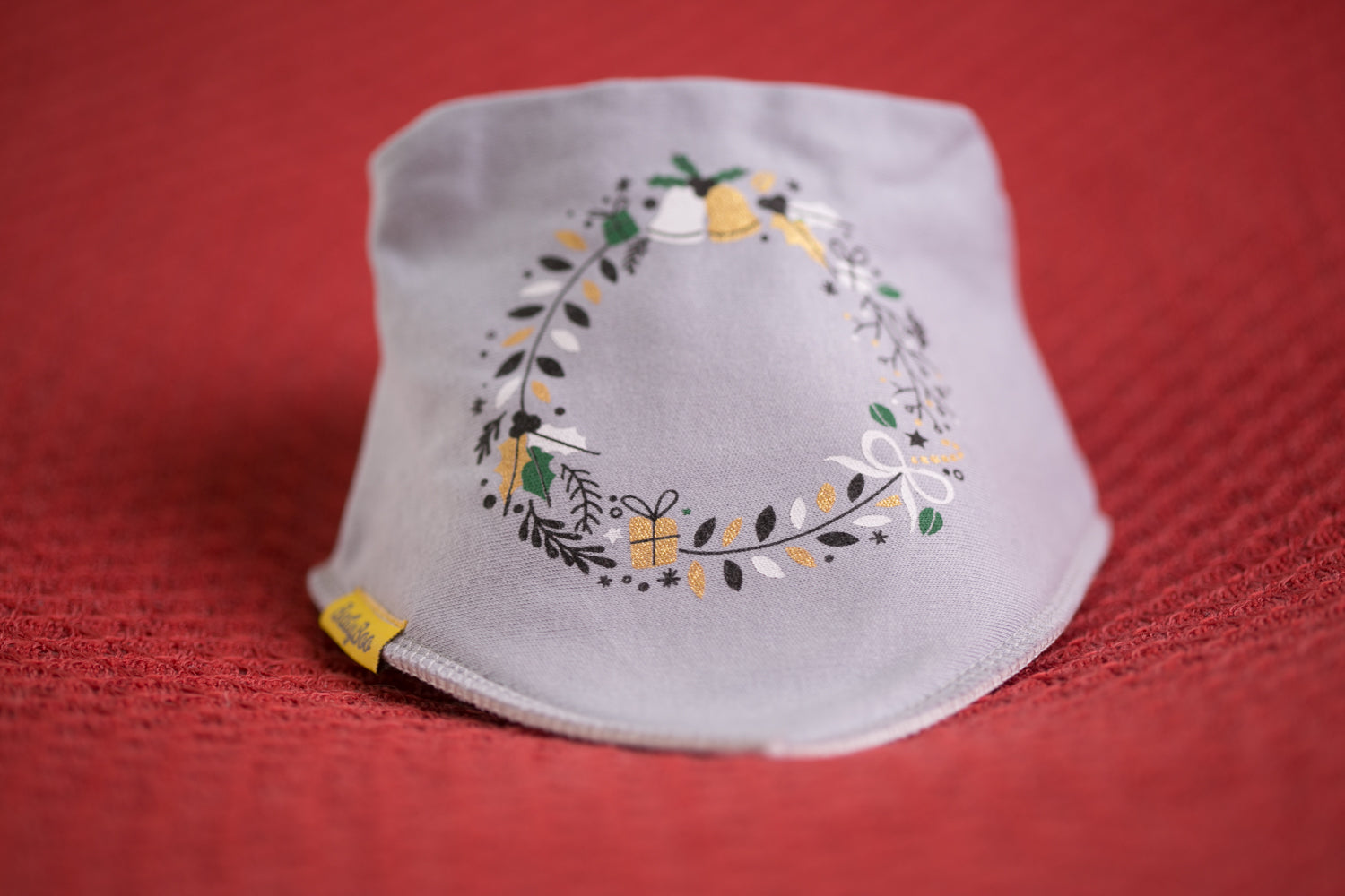 Grey holly wreath organic cotton bandana bib