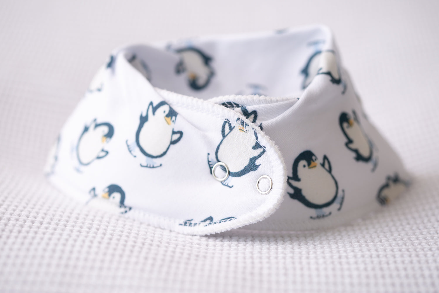 Skating penguins organic cotton DribbleBoo bandana bib