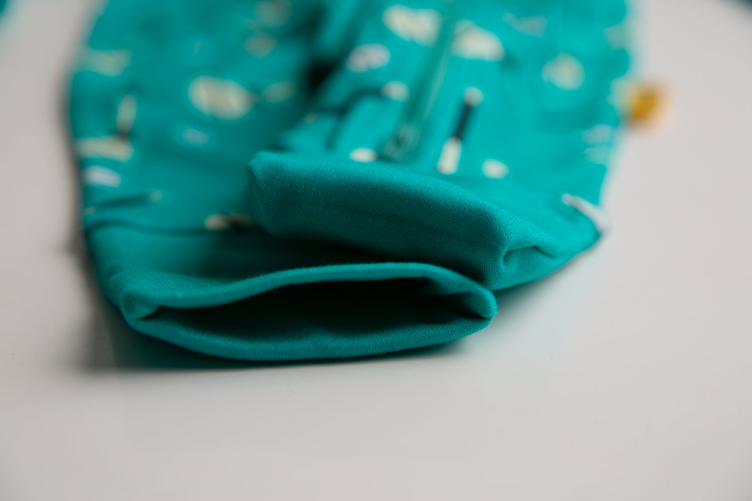 Teal GAA organic cotton ZippyBoo suit