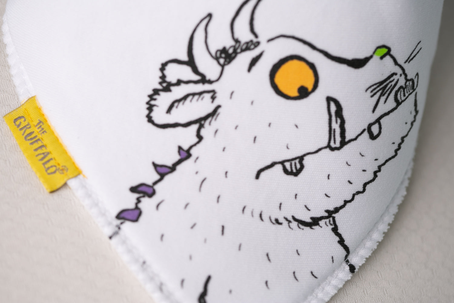 His eyes are orange Organic cotton DribbleBoo bandana bib