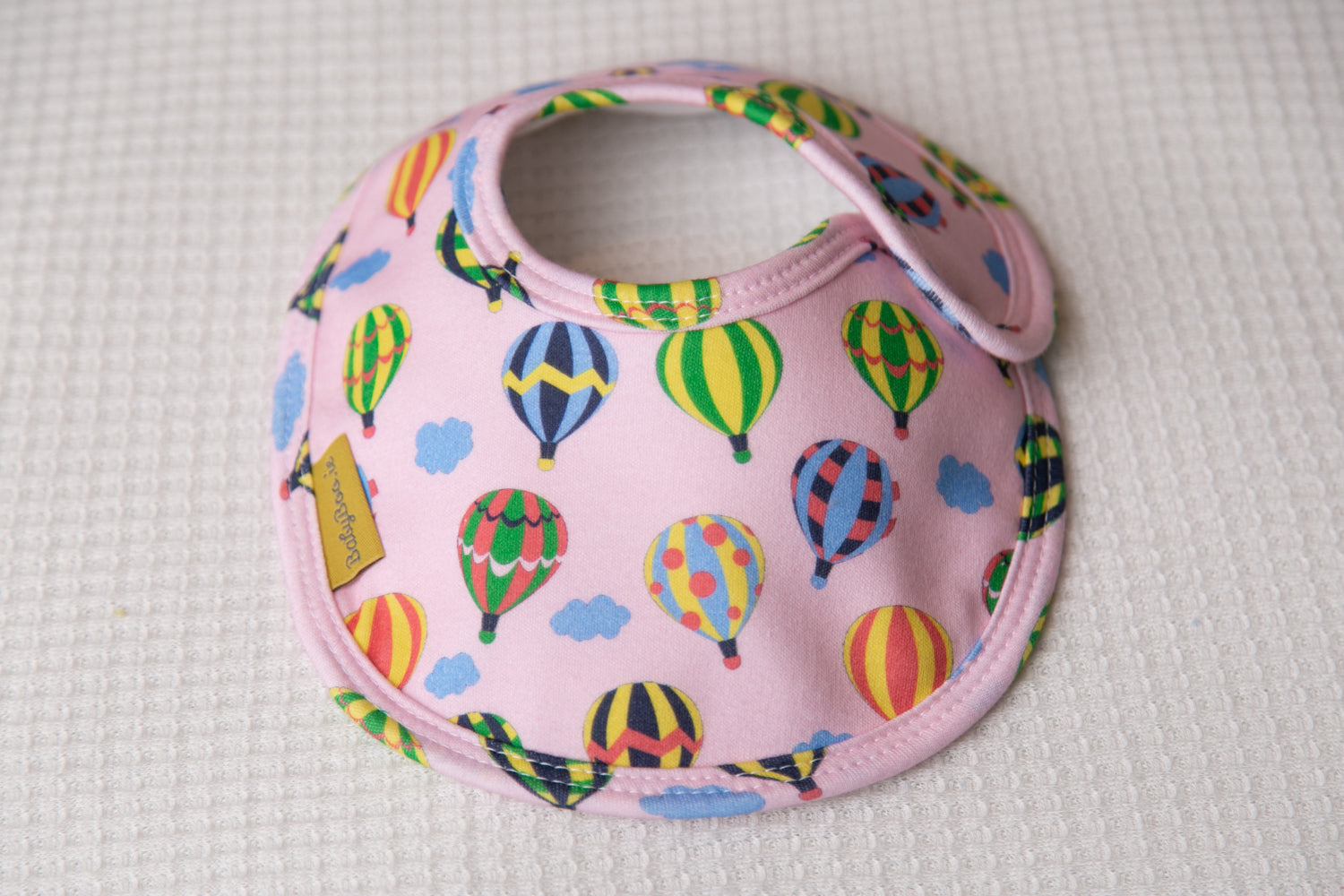 Pink hot air balloons organic cotton LittleBoo baby bib