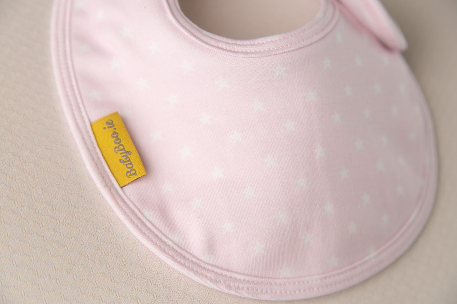 Light pink stars organic cotton LittleBoo baby bib