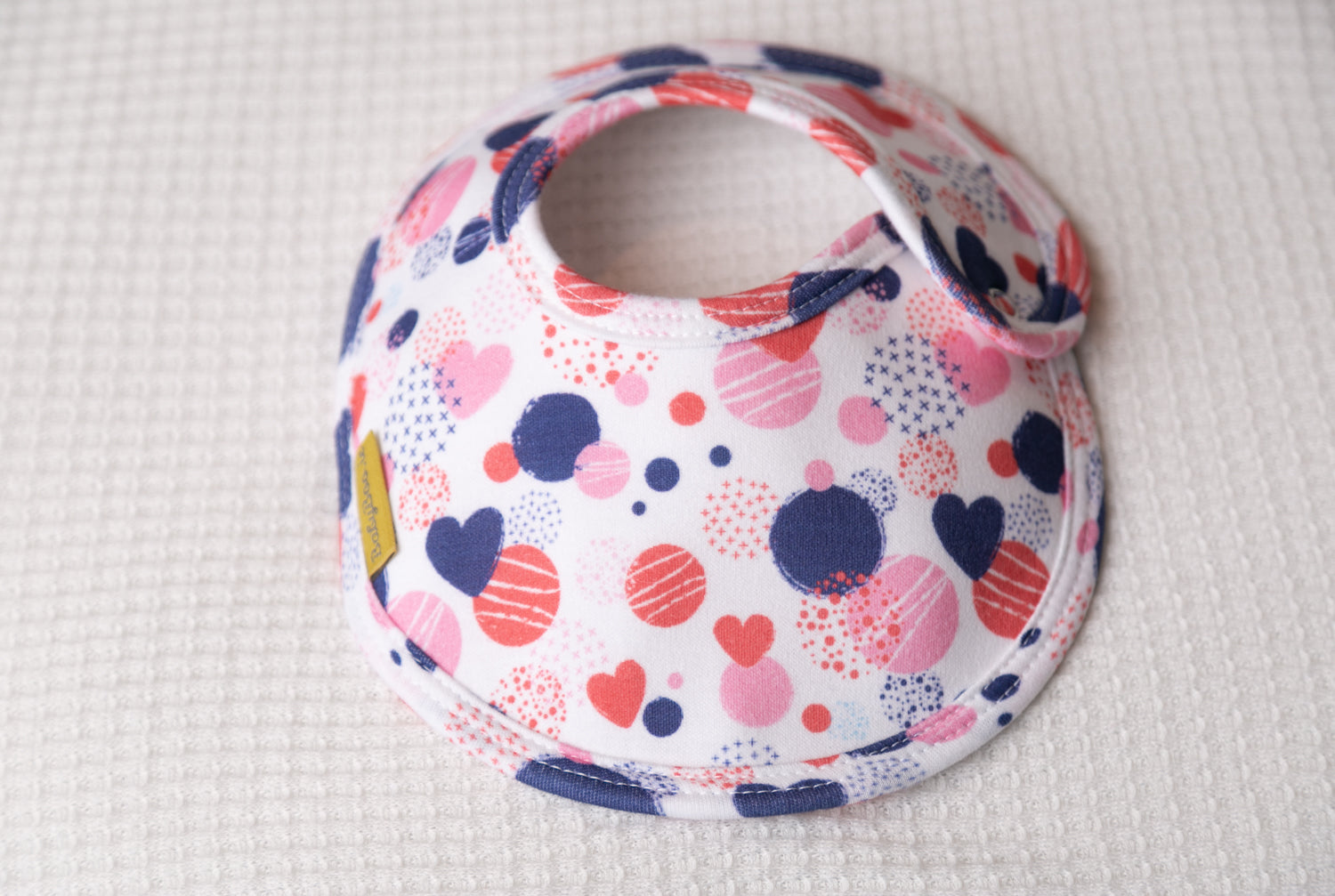 Abstract hearts organic cotton LittleBoo baby bib