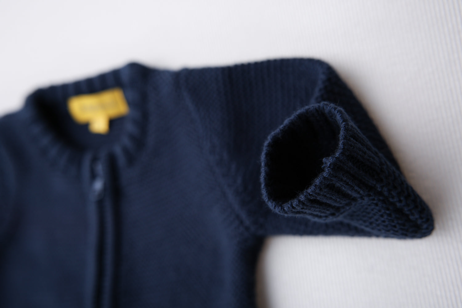 Navy organic cotton zipped cardigan