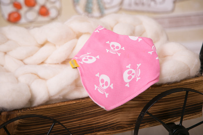 Skull and crossbone pink organic cotton DribbleBoo bandana bib