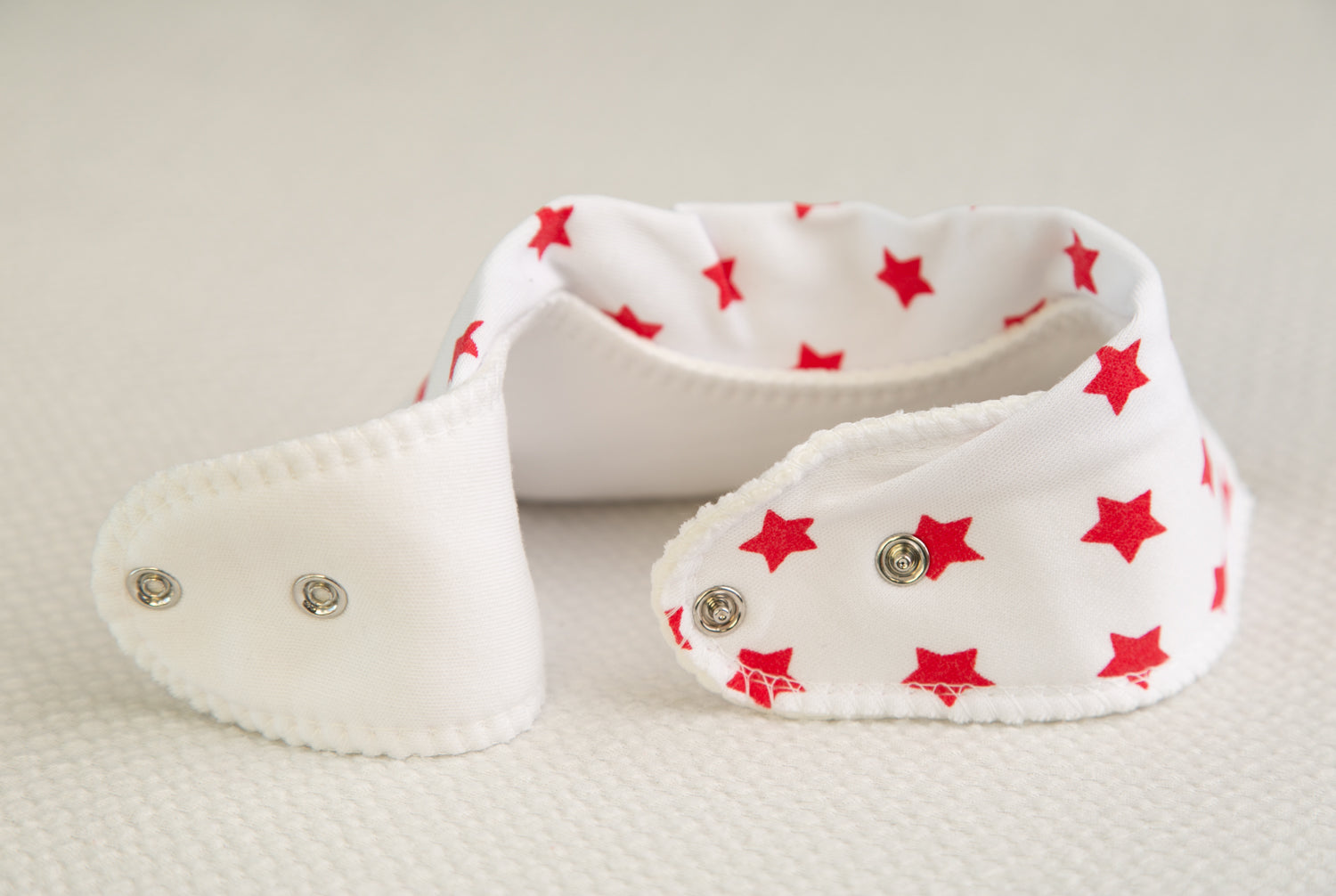 White with Red stars organic cotton DribbleBoo bandana bib