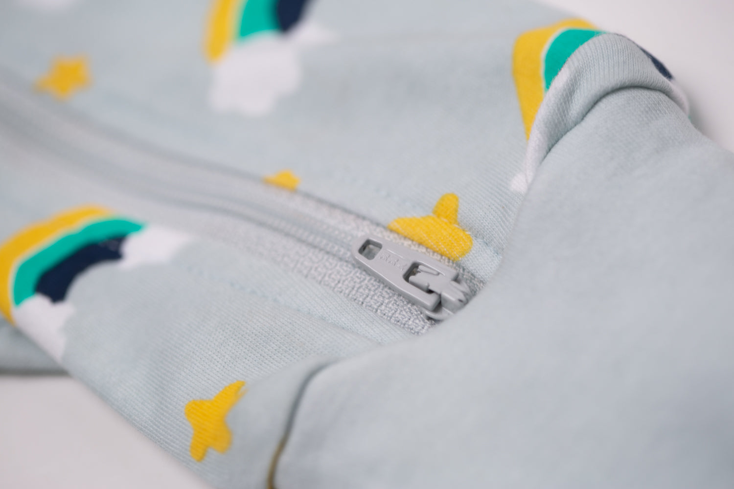 Aqua rainbows with navy organic cotton ZippyBoo suit