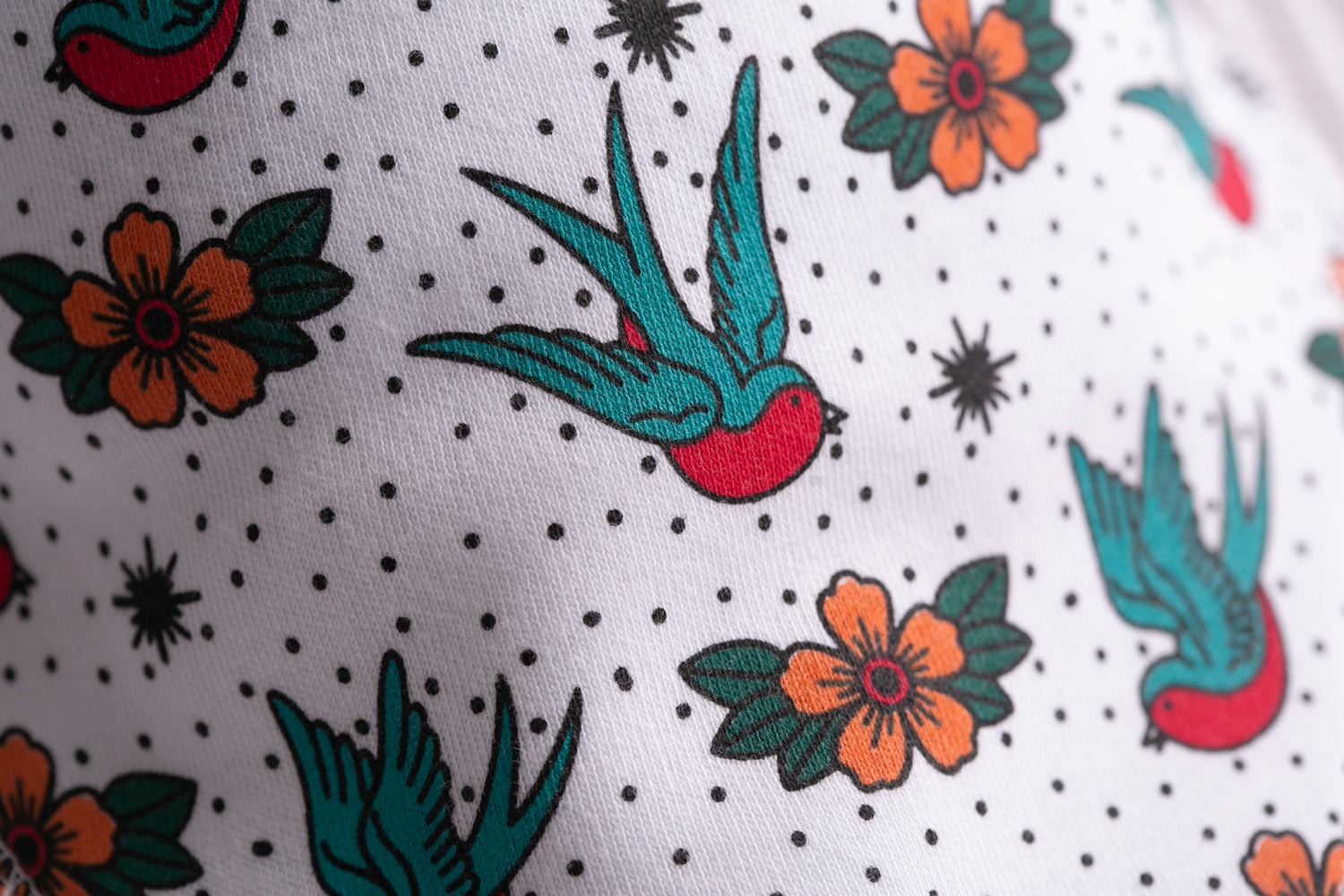 Soaring Swallows organic cotton DribbleBoo bandana bib