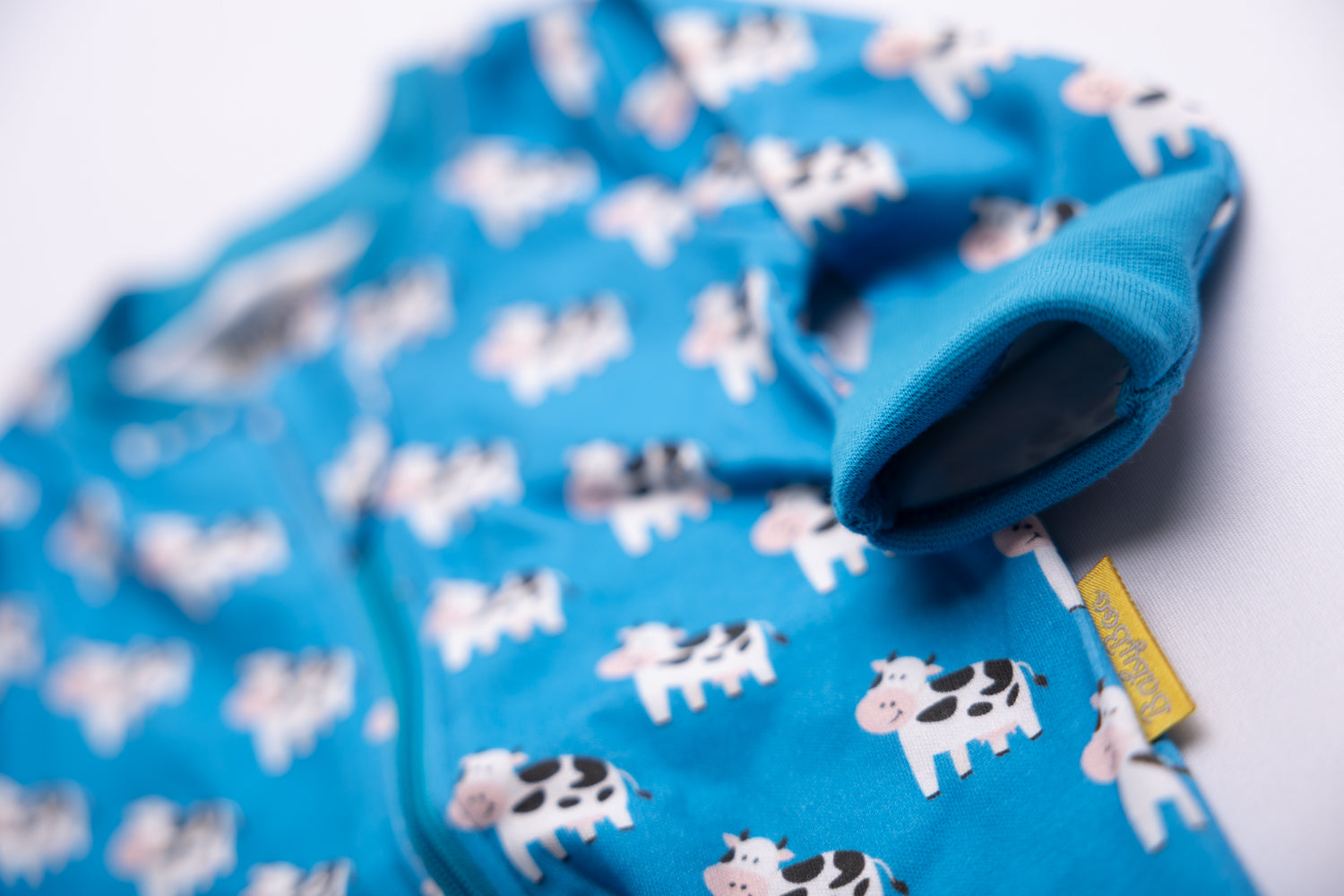 Blue Bessie Cow organic cotton ZippyBoo suit