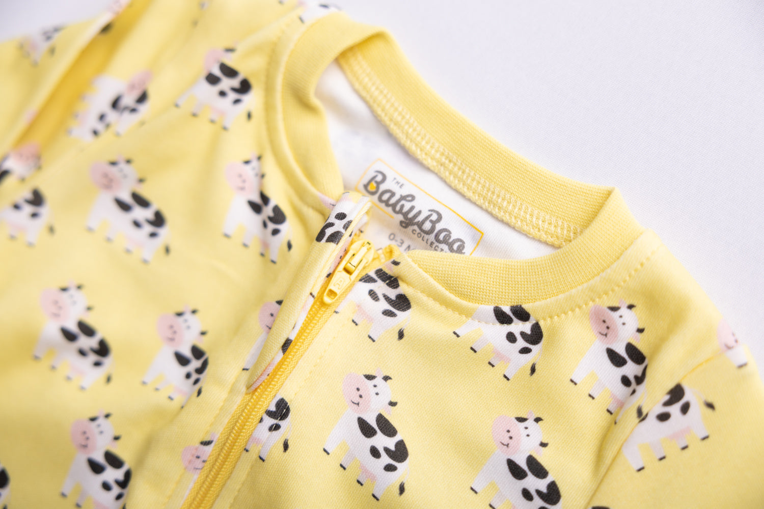 Lemon Bessie Cow organic cotton ZippyBoo suit