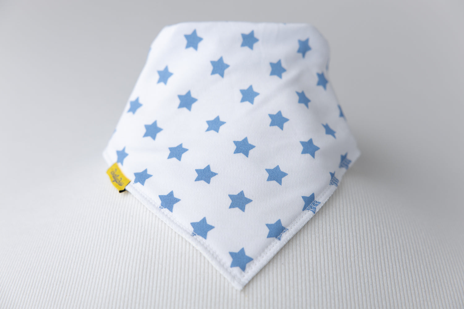 White with blue stars organic cotton DribbleBoo bandana bib