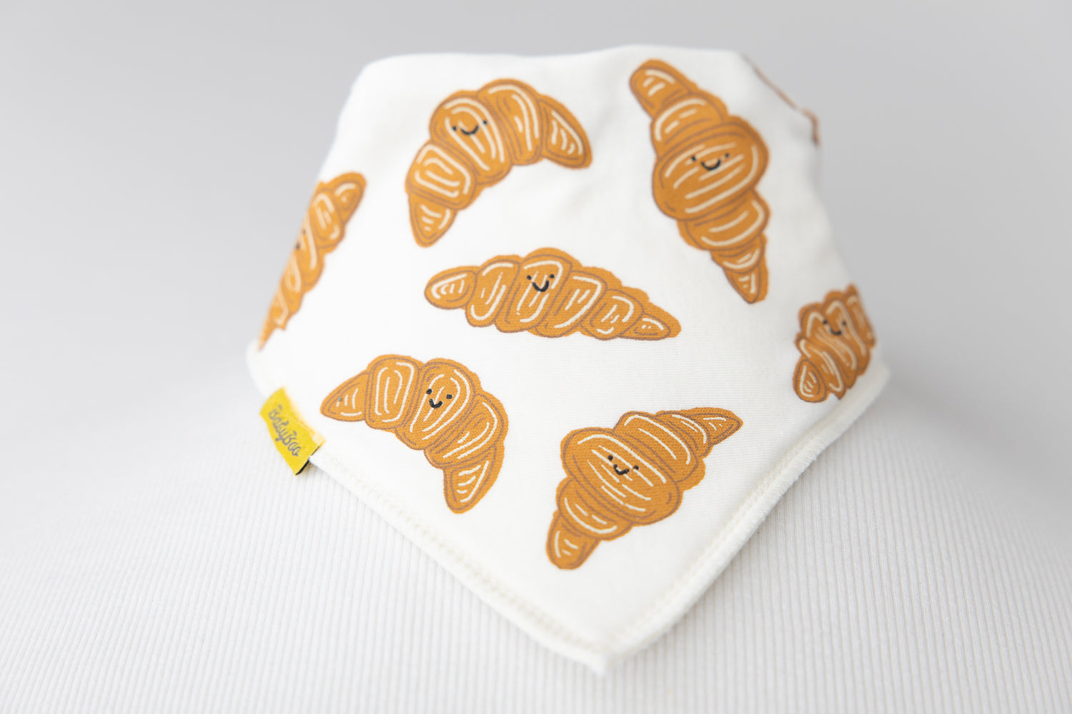 Le Petit Croissant cream organic cotton DribbleBoo bandana bib