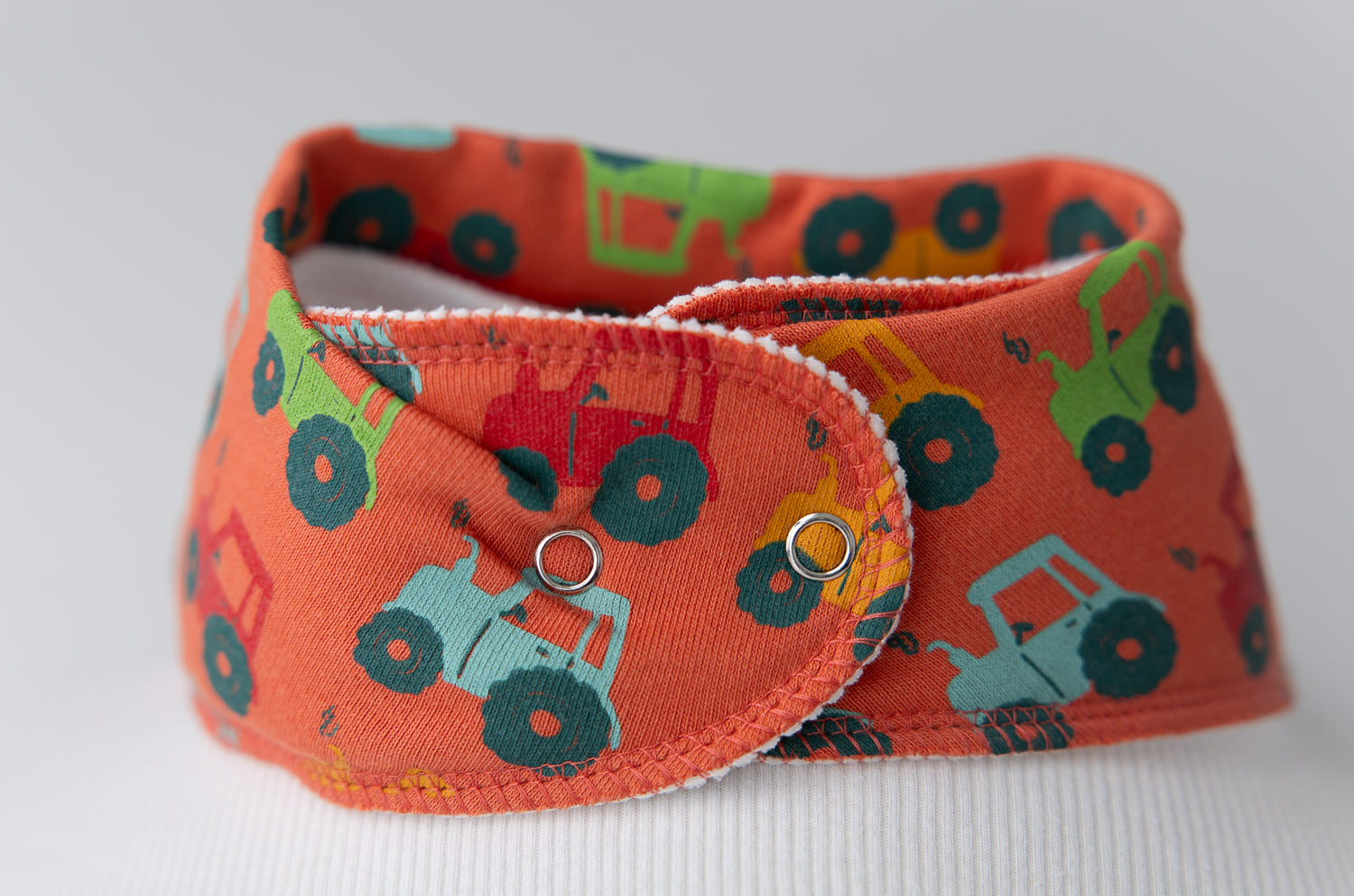Tractor run orange organic cotton DribbleBoo bandana bib