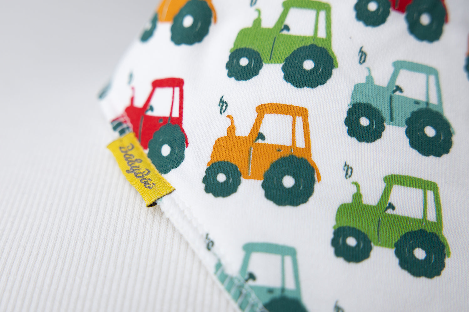Tractor run white organic cotton DribbleBoo bandana bib