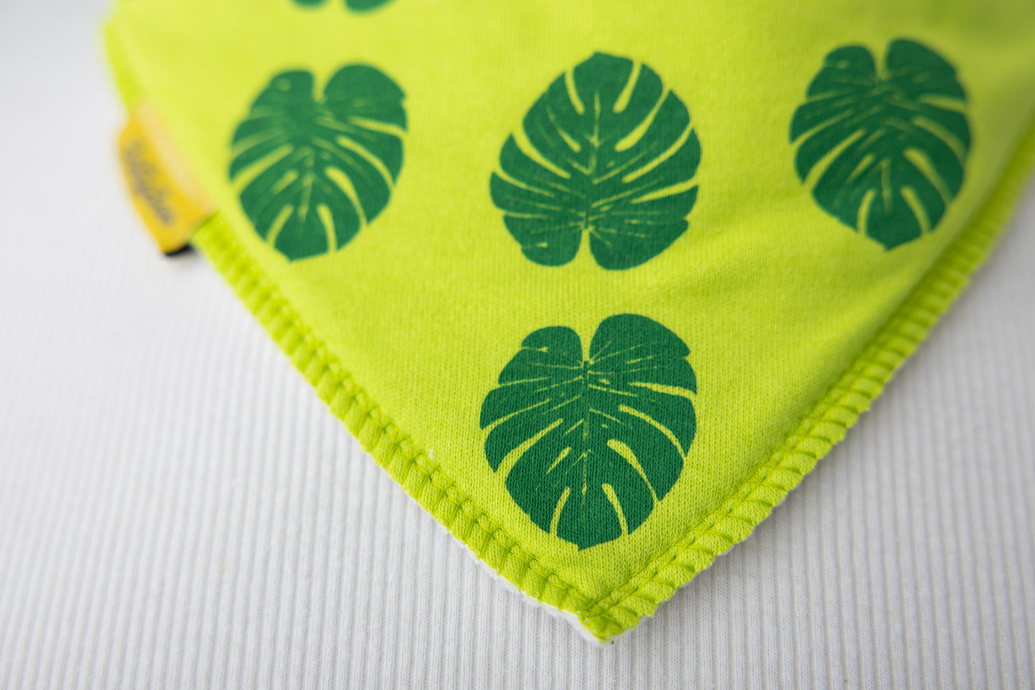 Fauna Monstera organic cotton DribbleBoo bandana bib
