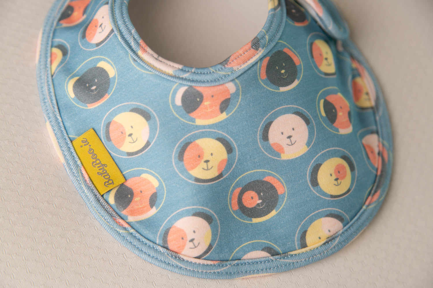 Teal Space Dogs organic cotton LittleBoo baby bib