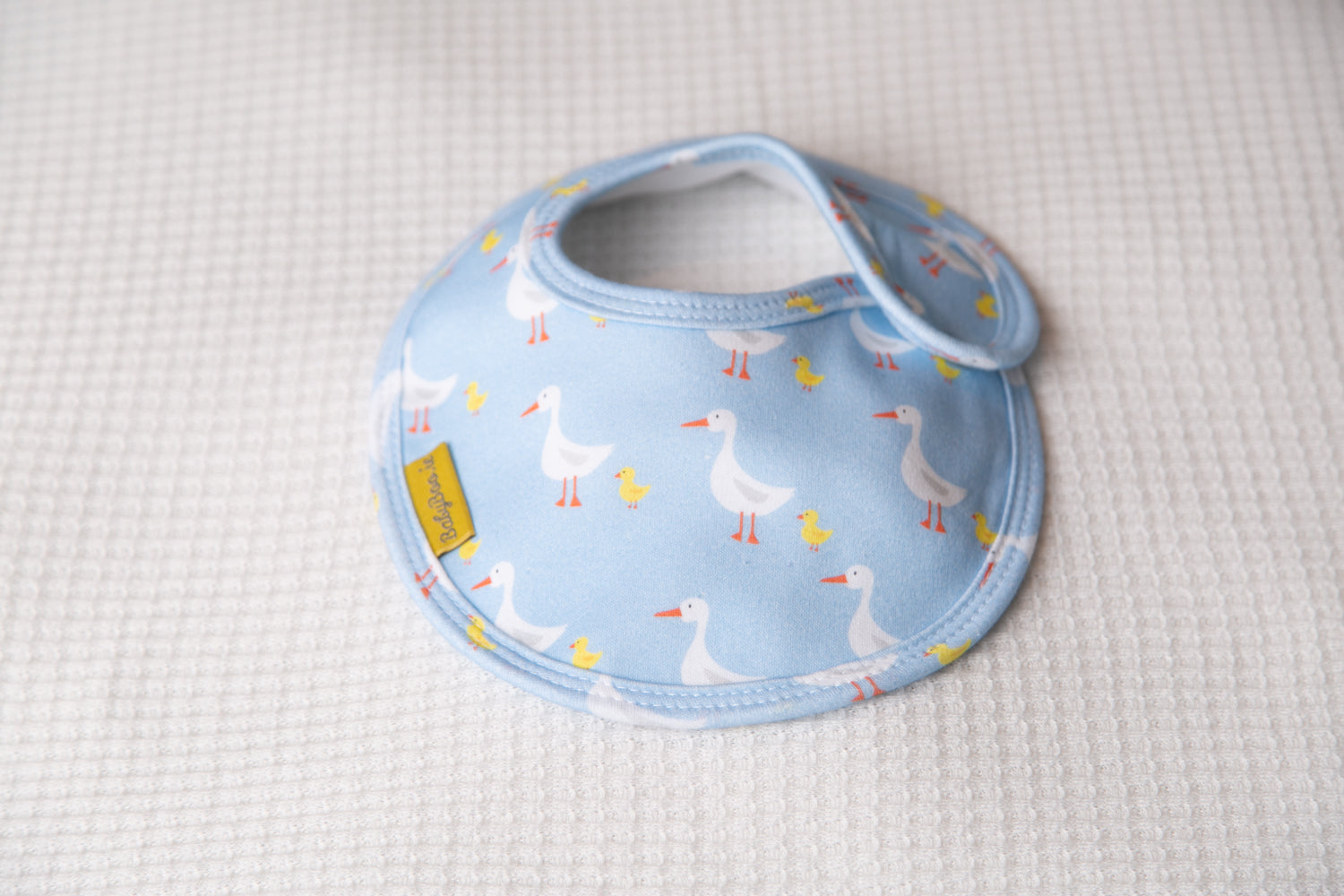 Blue duckies organic cotton LittleBoo baby bib