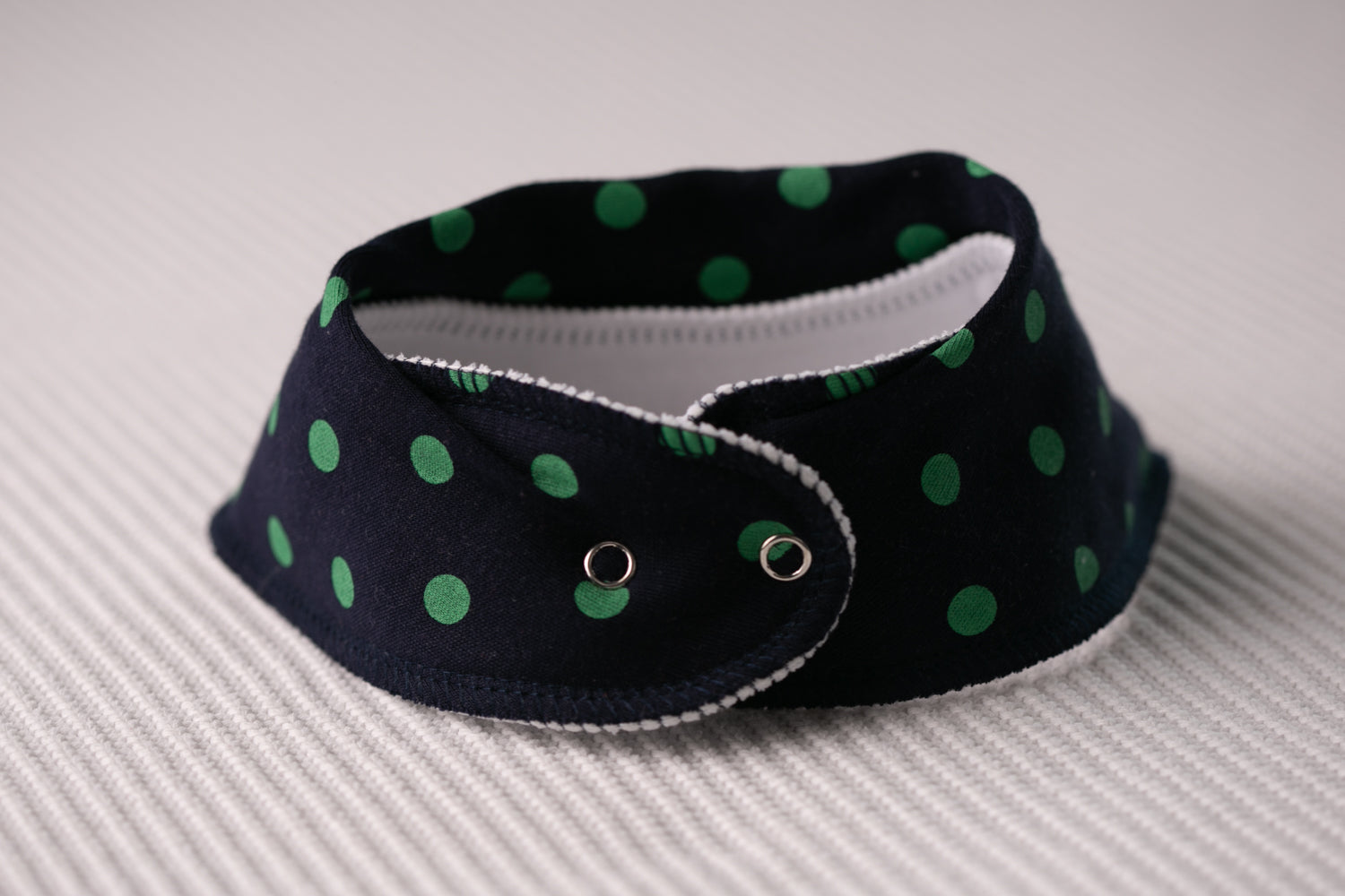 Navy with green polka organic cotton DribbleBoo bandana bib