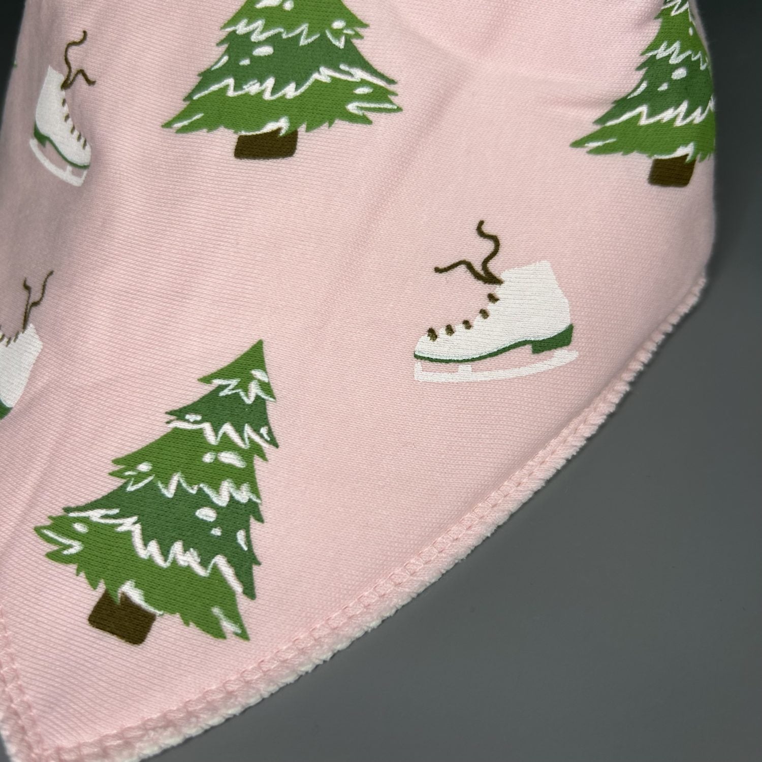 Skating at Christmas organic cotton DribbleBoo bandana bib