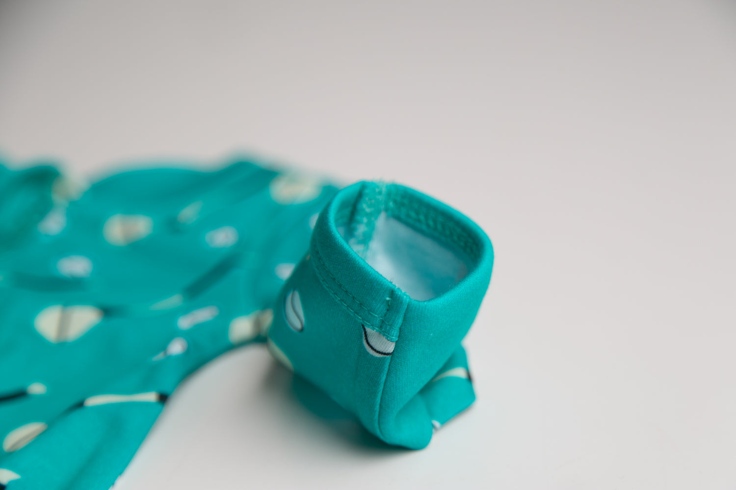 Teal GAA organic cotton ZippyBoo suit