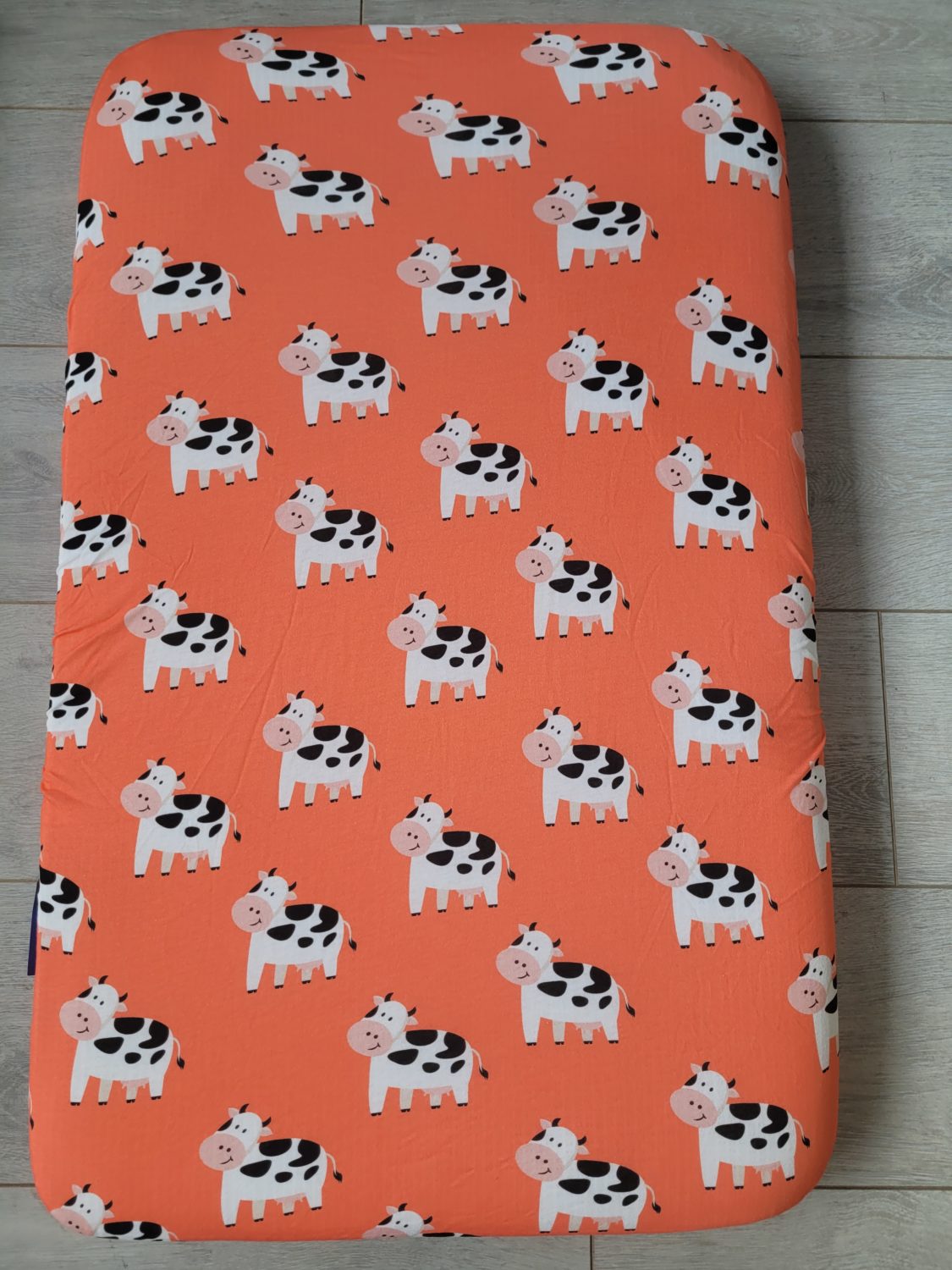Coral bessie cow organic cotton BeddyBoo fitted sheet