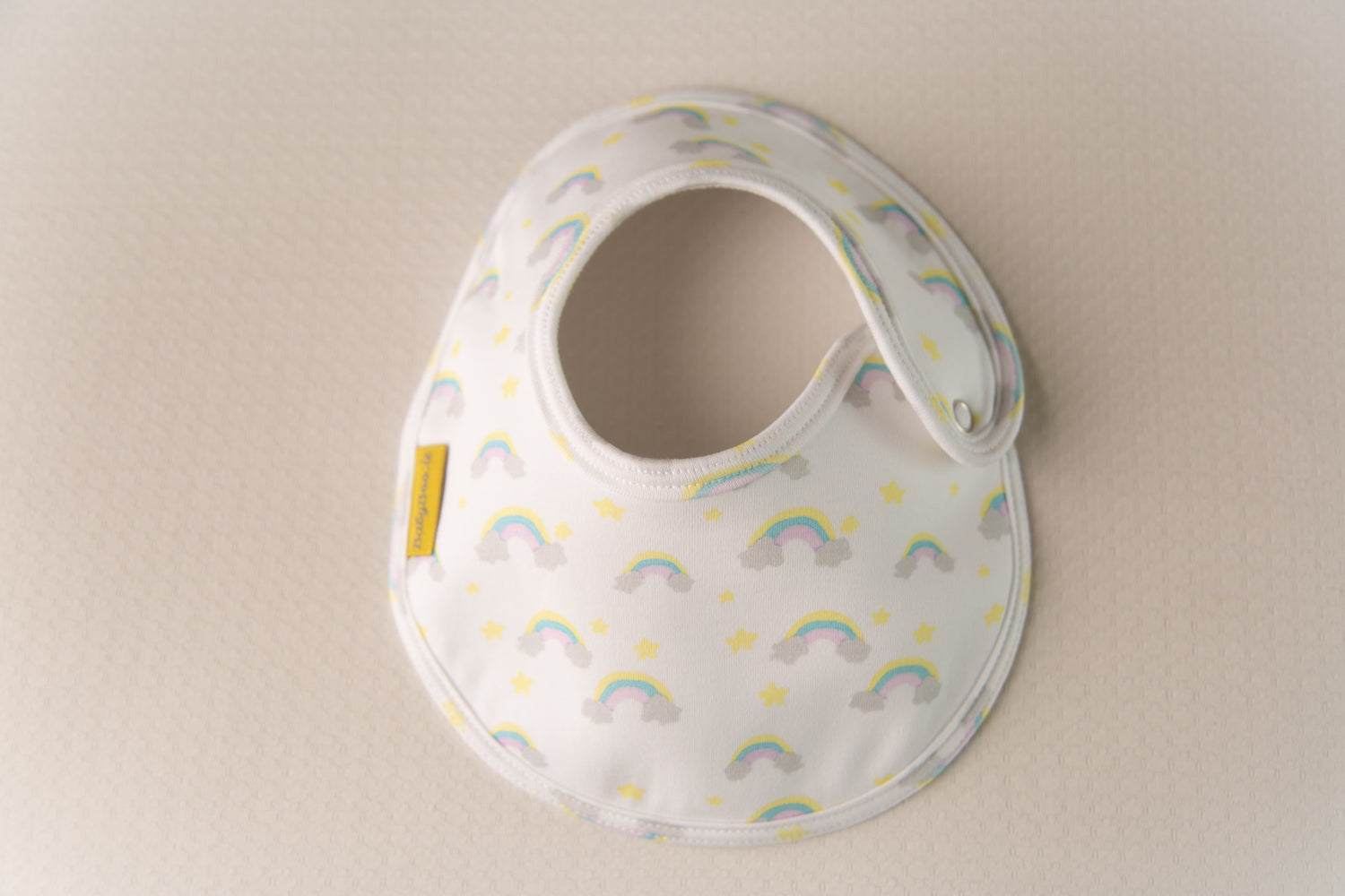 Painted rainbows white organic cotton LittleBoo baby bib