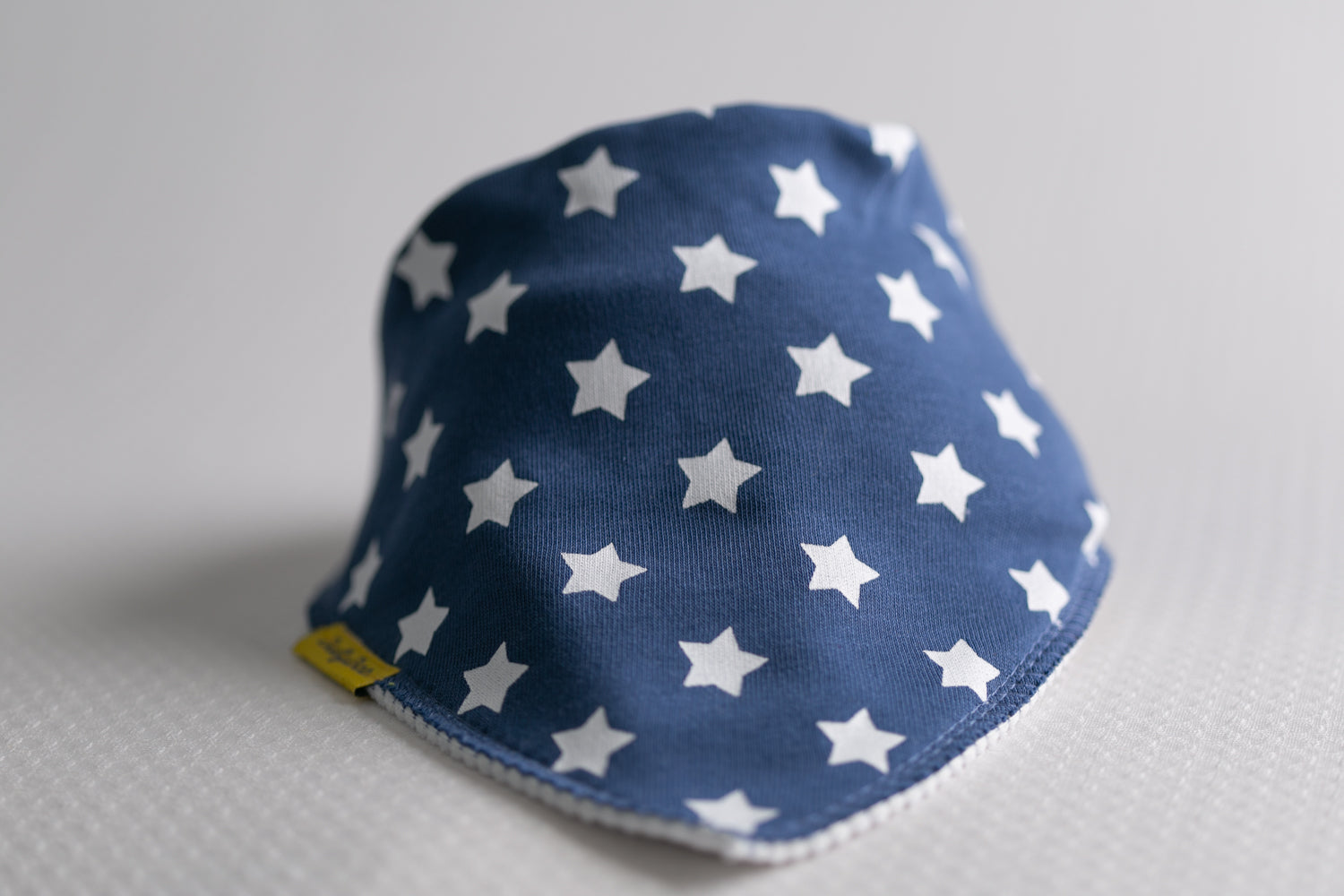 Blue with white stars organic cotton DribbleBoo bandana bib