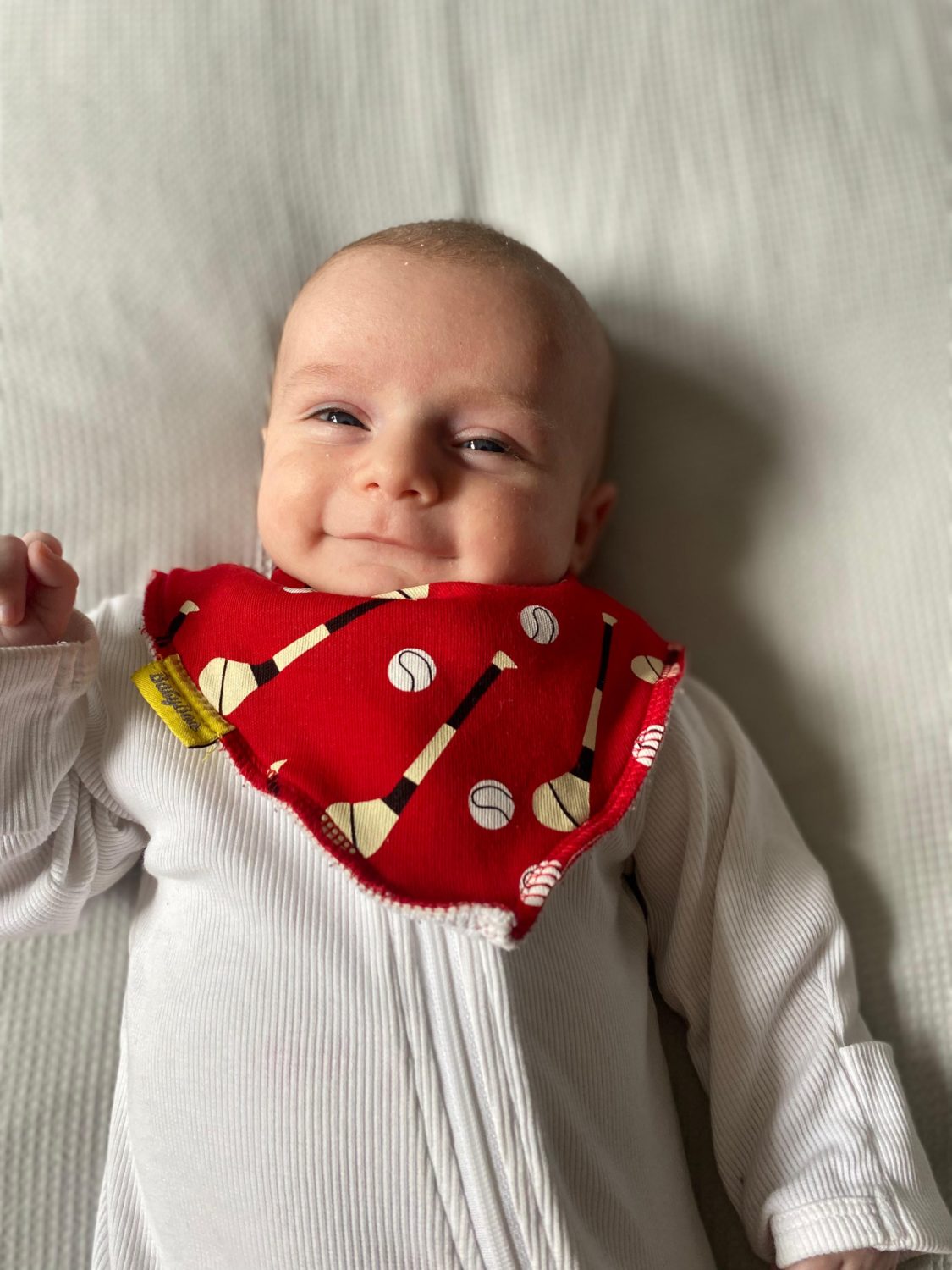 Red GAA mad organic cotton DribbleBoo bandana bib