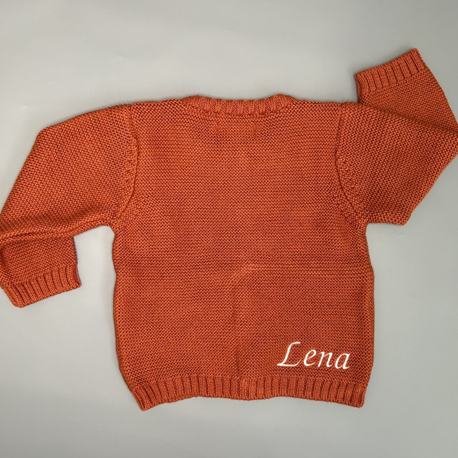 Rust organic cotton zipped cardigan
