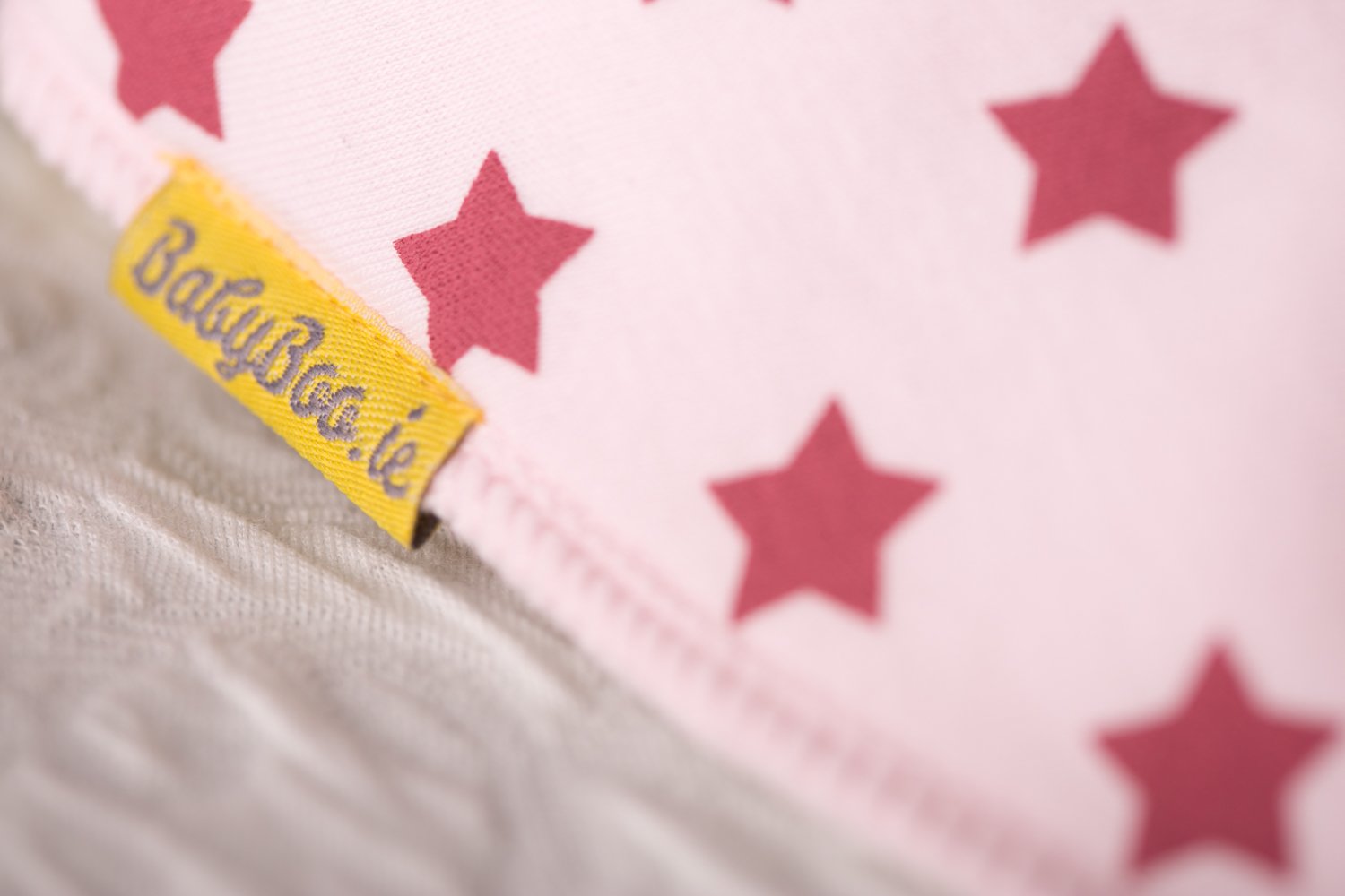 Berry stars on pink organic cotton DribbleBoo bandana bib