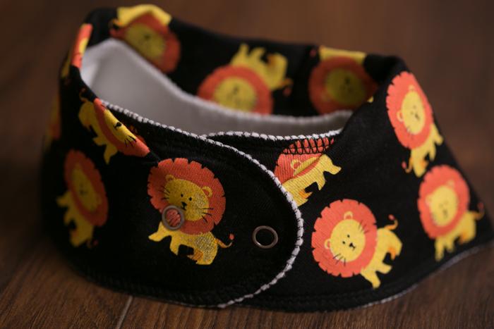 Black Larry the lion organic cotton DribbleBoo bandana bib
