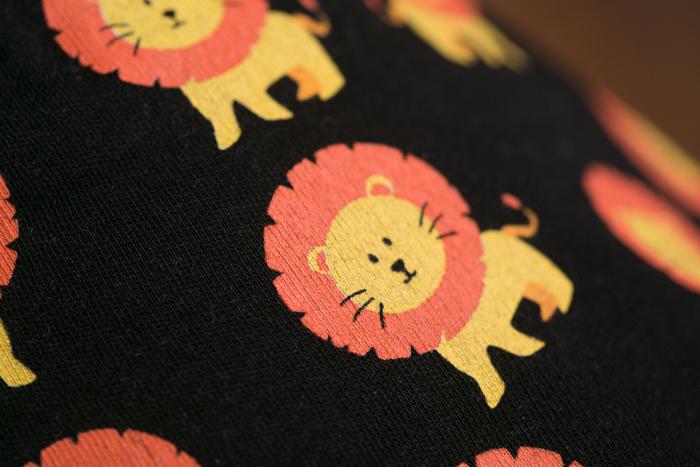 Black Larry the lion organic cotton DribbleBoo bandana bib