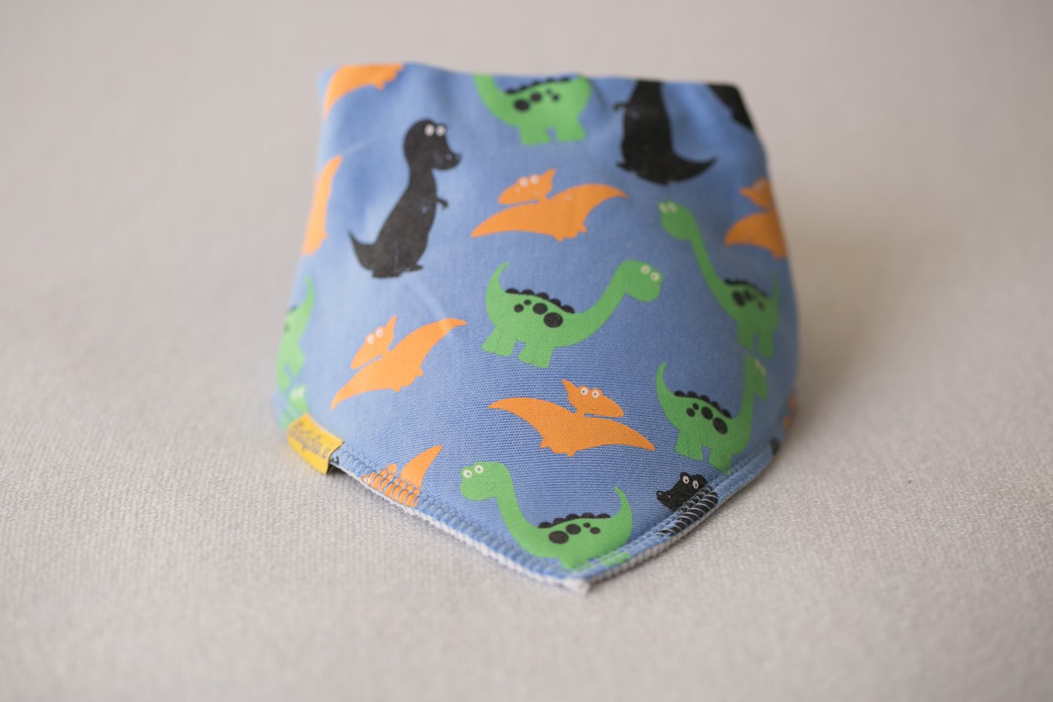 Blue dinos everywhere organic cotton DribbleBoo bandana bib