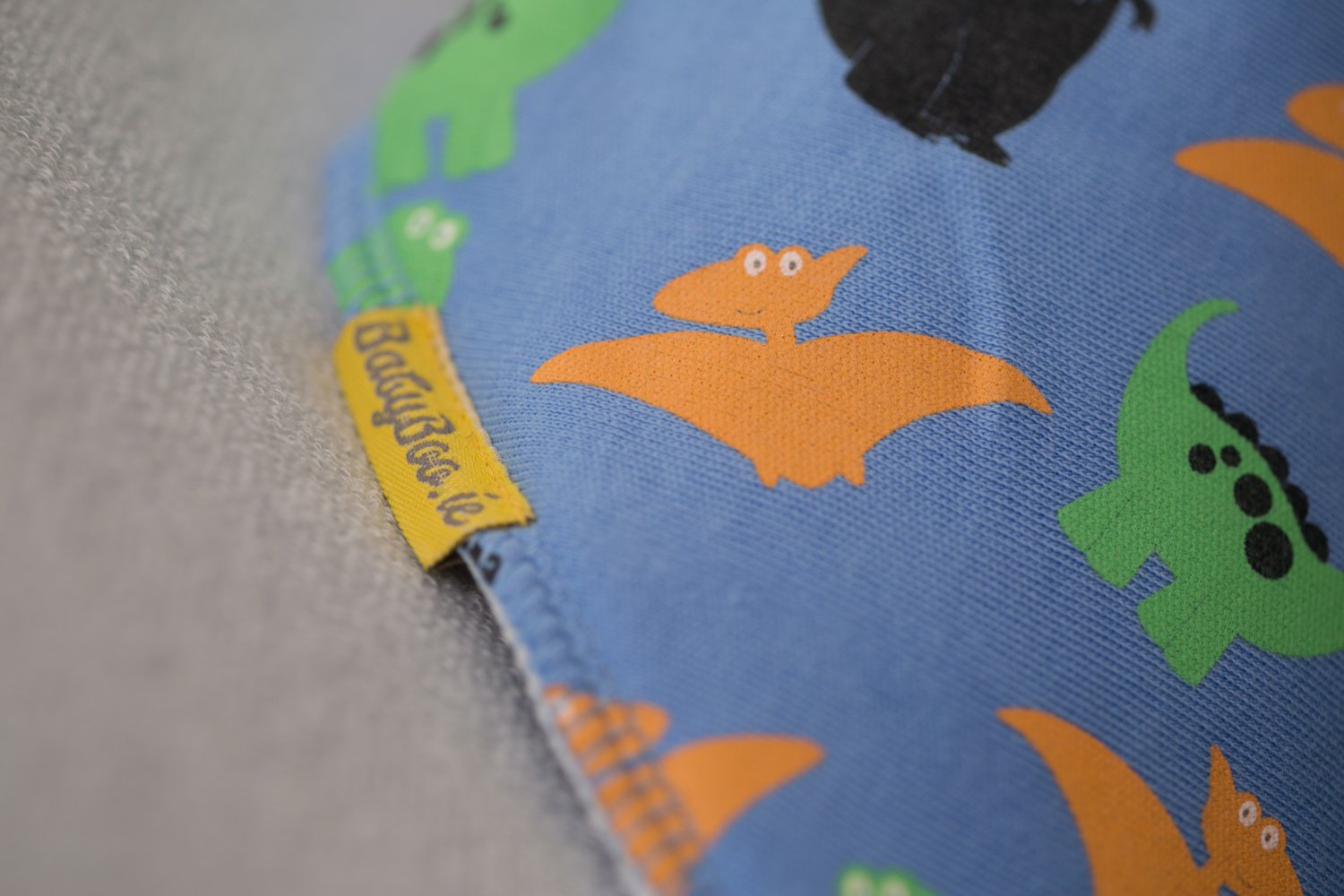 Blue dinos everywhere organic cotton DribbleBoo bandana bib