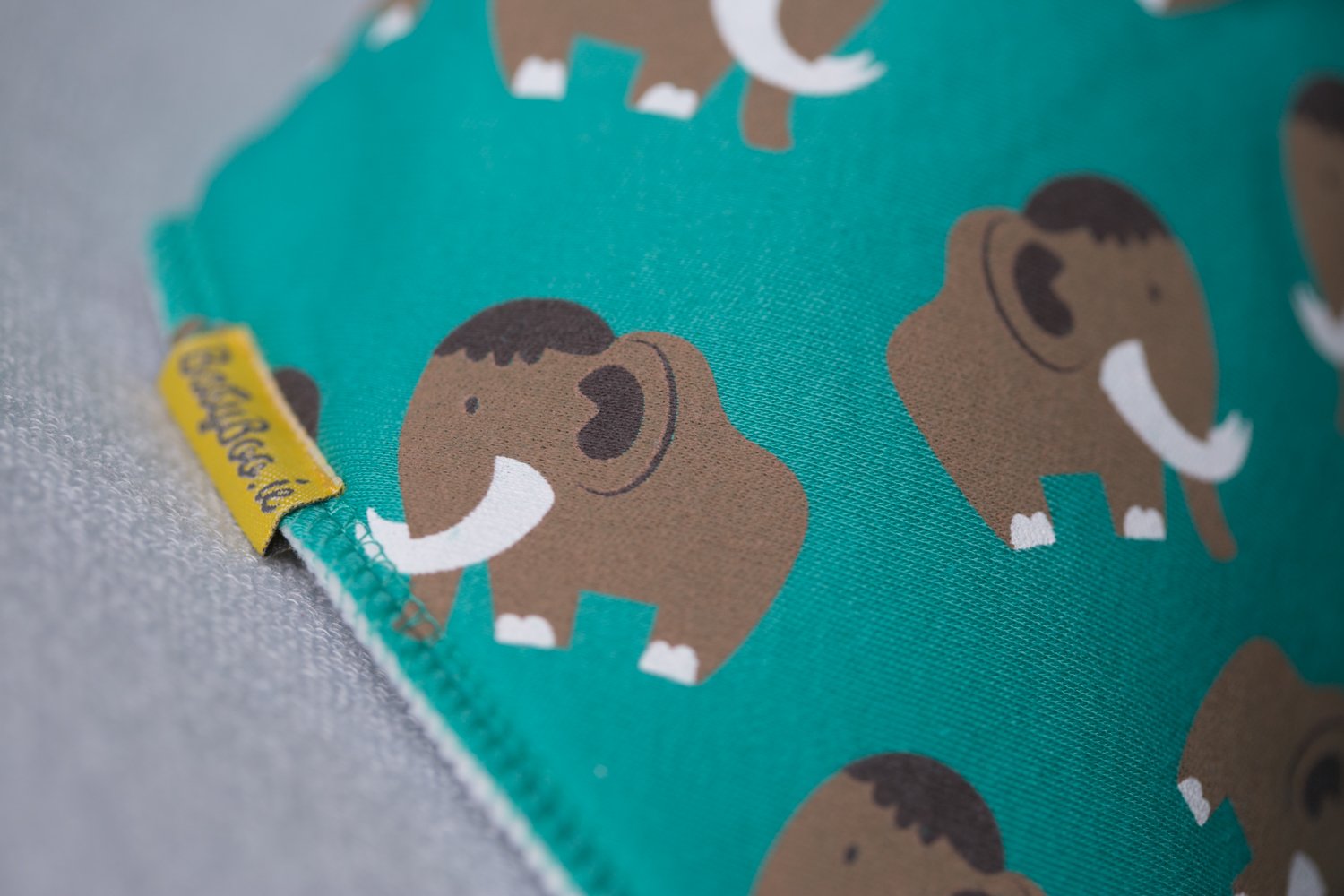 Marty the Mammoth organic cotton DribbleBoo bandana bib