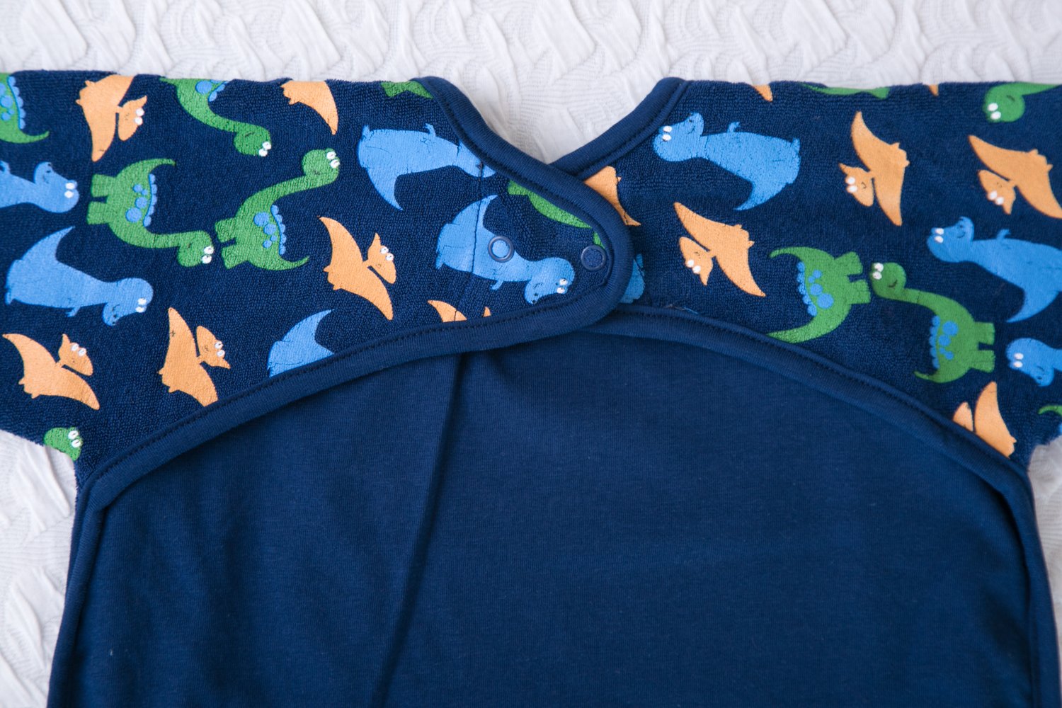 Navy dinos YummyBoo feeding bib