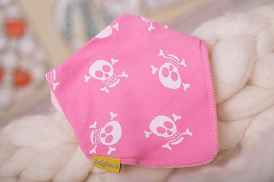 Skull and crossbone pink organic cotton DribbleBoo bandana bib
