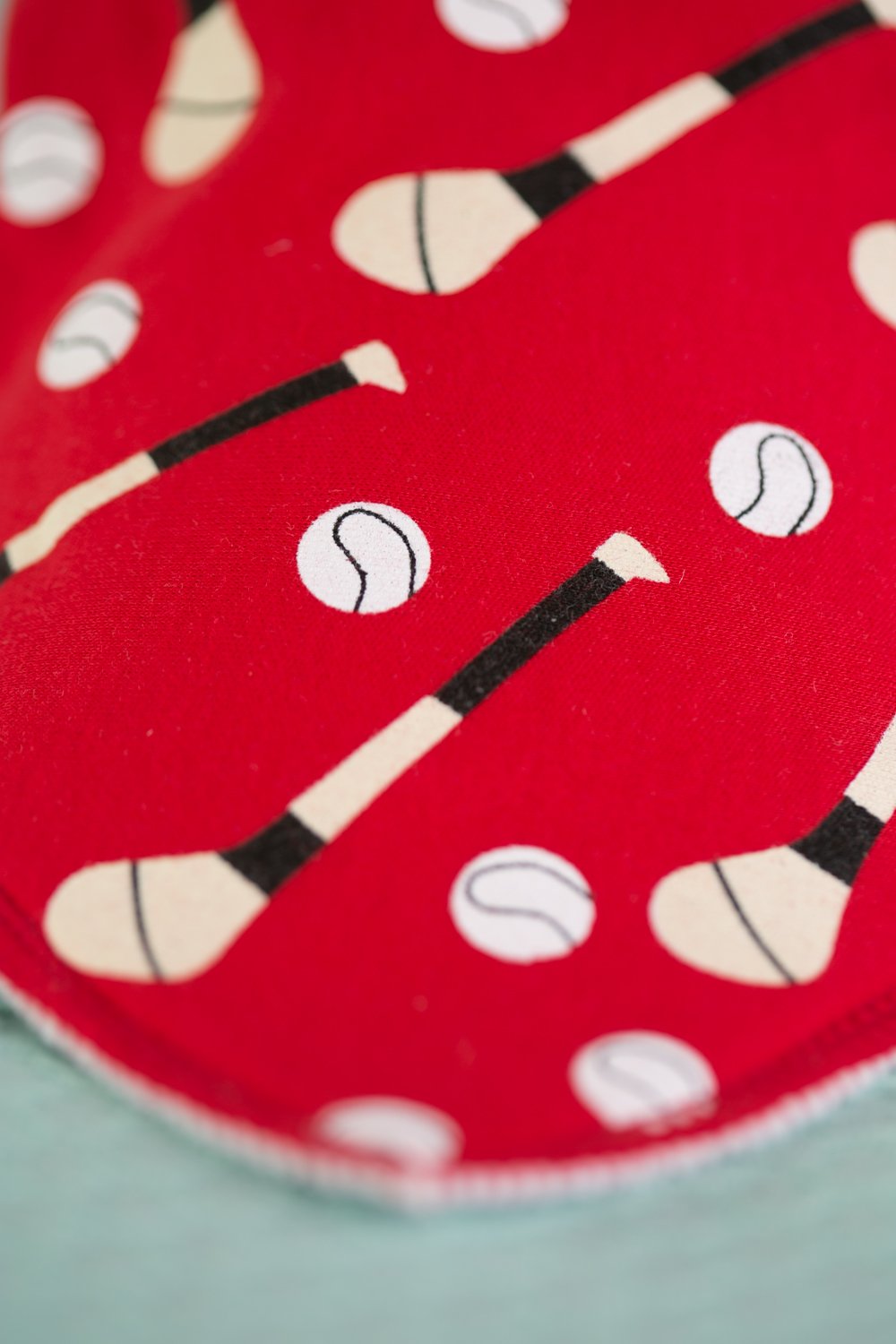 Red GAA mad organic cotton DribbleBoo bandana bib
