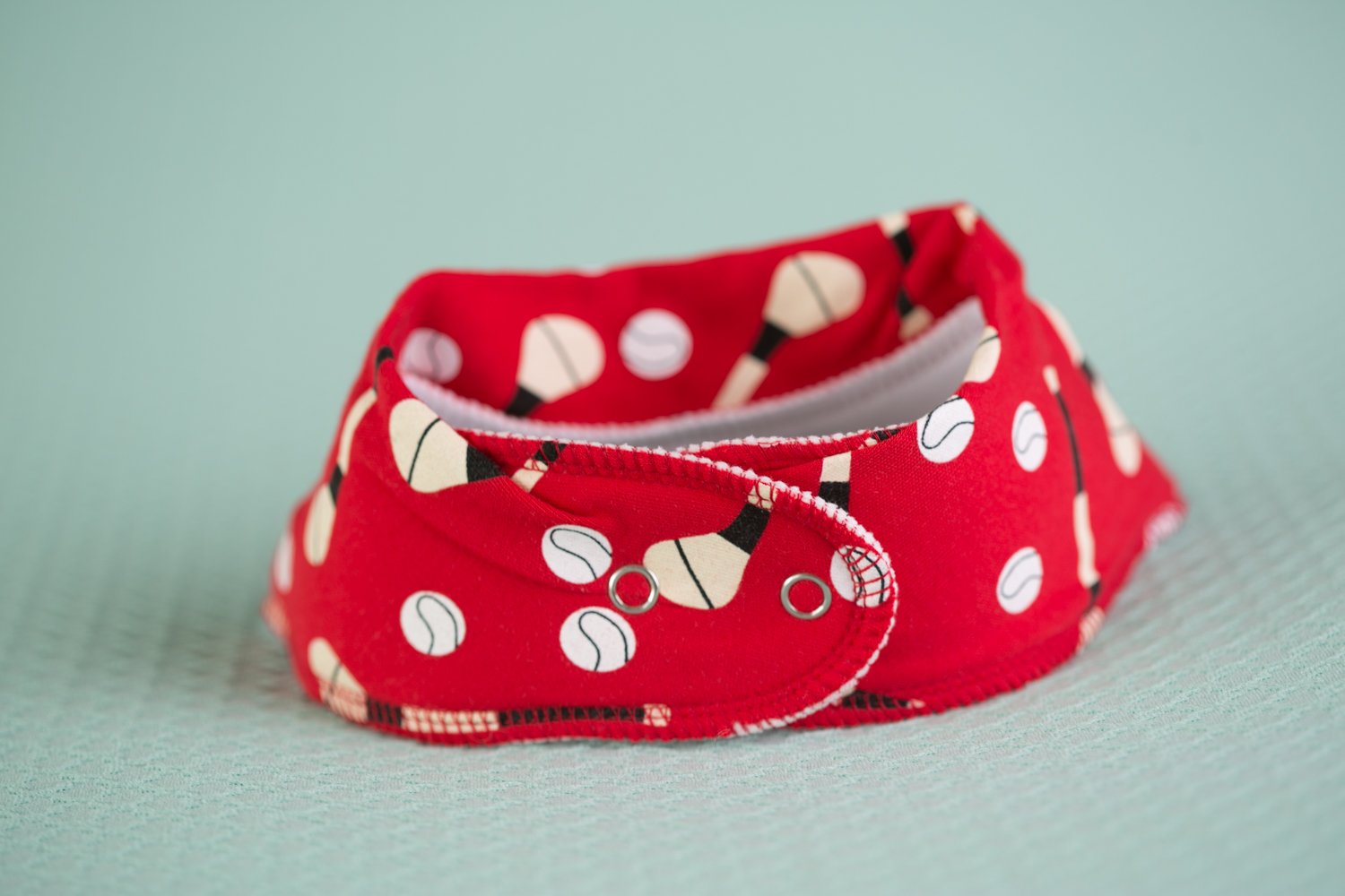 Red GAA mad organic cotton DribbleBoo bandana bib