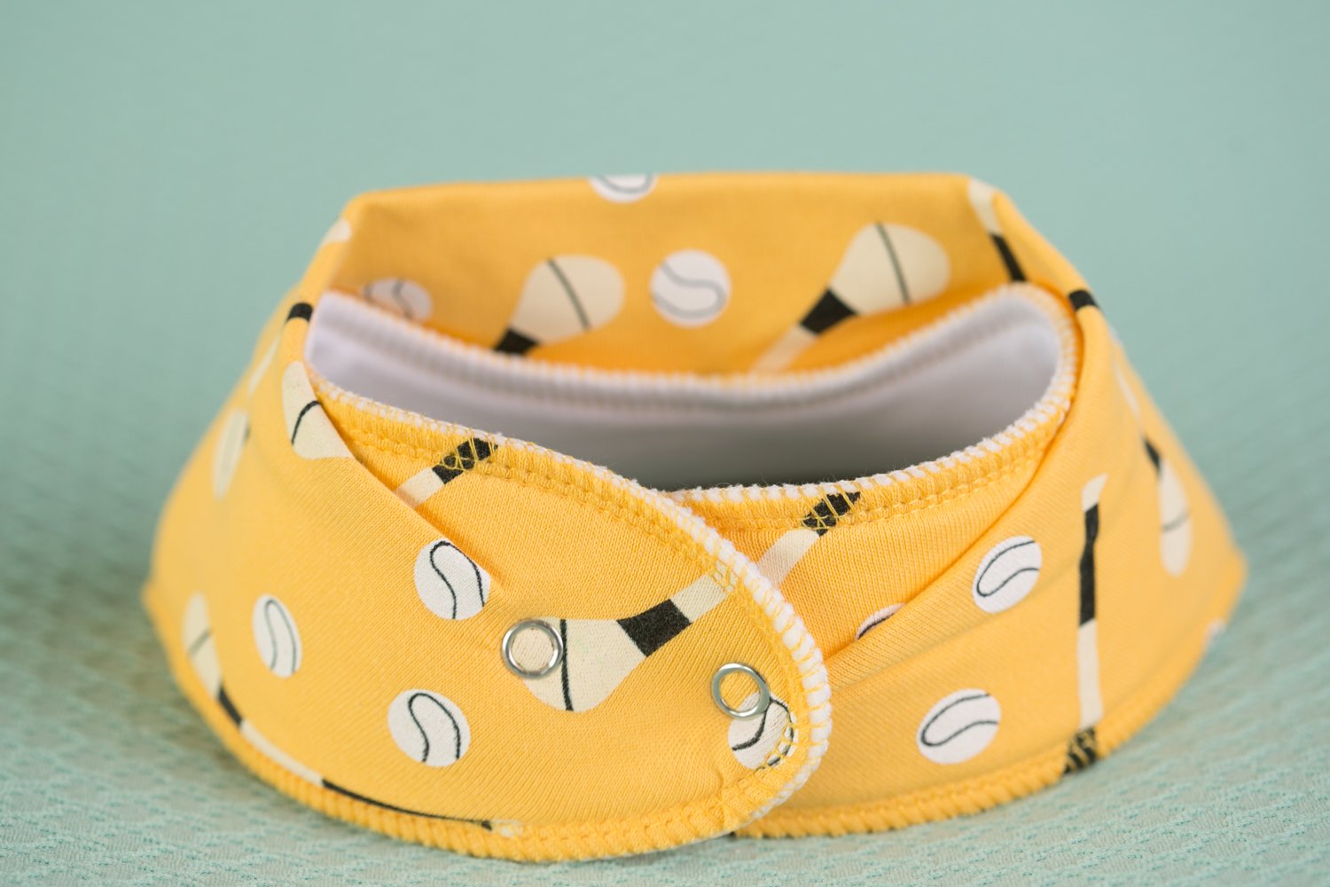 Yellow GAA mad organic cotton DribbleBoo bandana bib